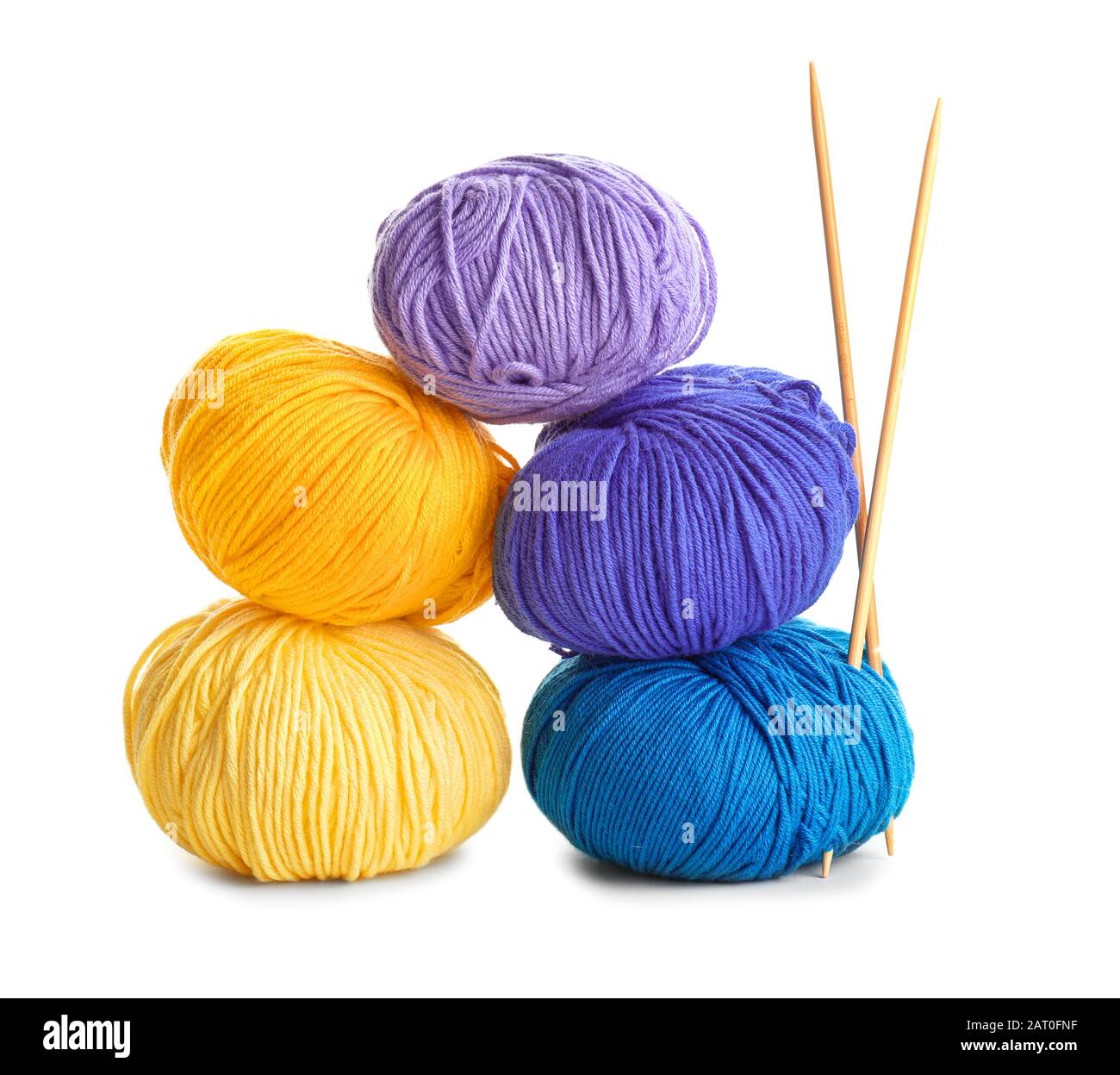 Knitting yarns and needles on white background Stock Photo - Alamy