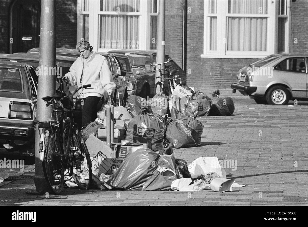 Garbage bags on the street that are not picked up in connection with actions against discounts on salaries Date: November 7, 1983 Keywords: waste, wage and price policy, cleaning services, strikes Stock Photo