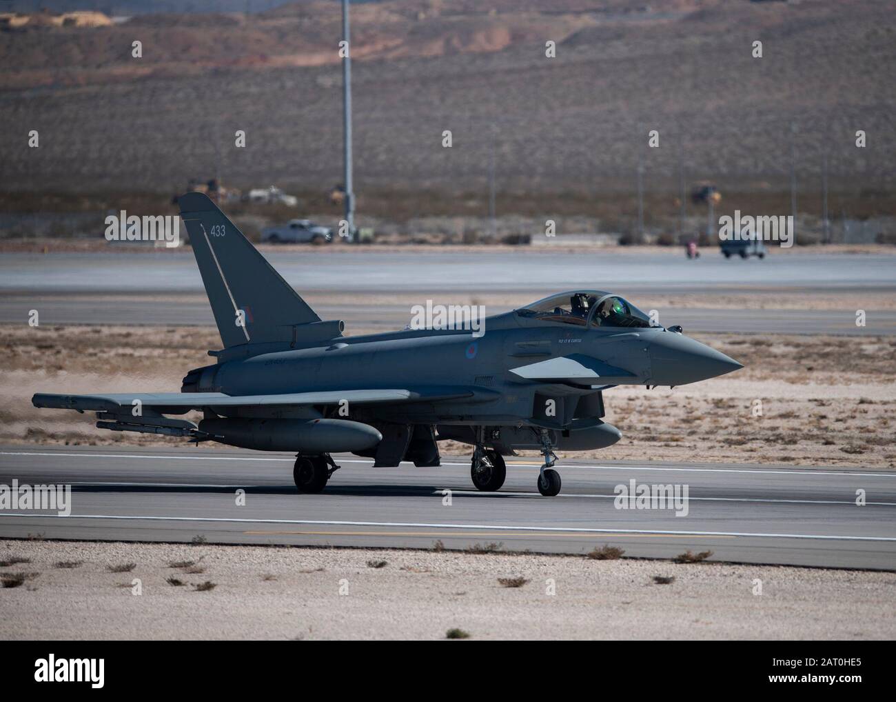 A Royal Air Force (RAF) Typhoon FGR 4 assigned to the 41st Squadron (SQN), RAF Waddington, lands at Nellis Air Force Base, Nevada, Jan. 23, 2019. The RAF has a long working history with the United States Military dating back to the first World War. (U.S. Air Force photo by Airman 1st Class Bryan Guthrie) Stock Photo