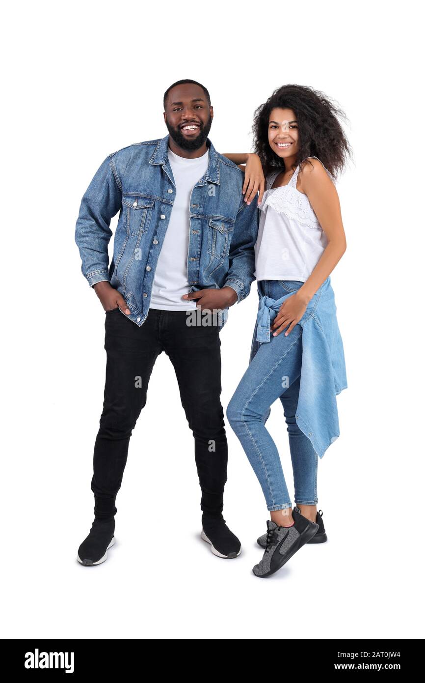 Portrait of stylish young African-American couple on white background ...