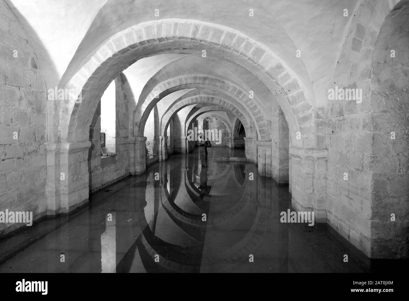 Anthony Gormley Sound II statue in crypt of Winchester Cathedral Stock Photo