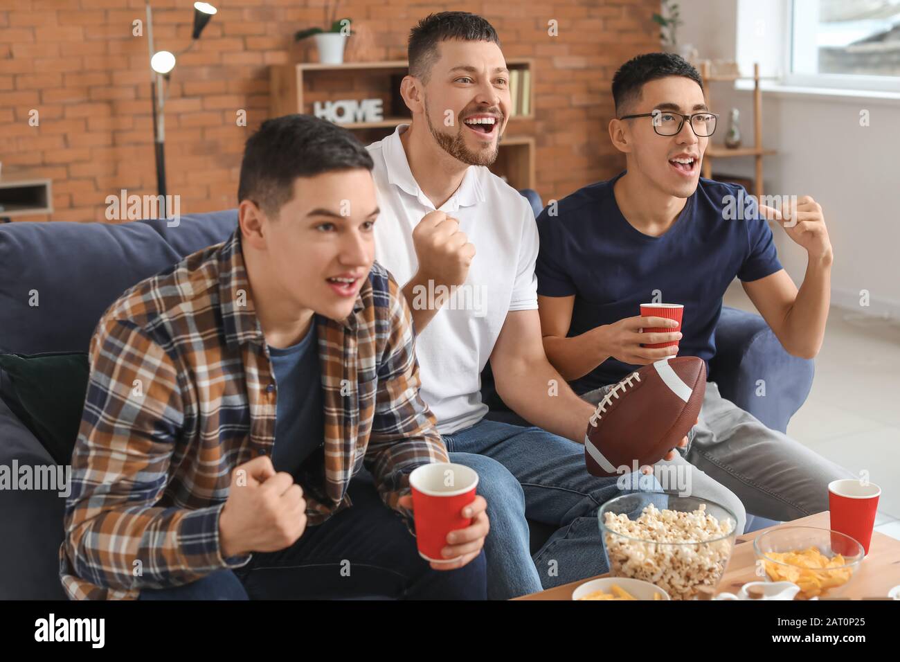 Watching Rugby Games Sport rugby league sitting hi-res stock photography and images - Alamy