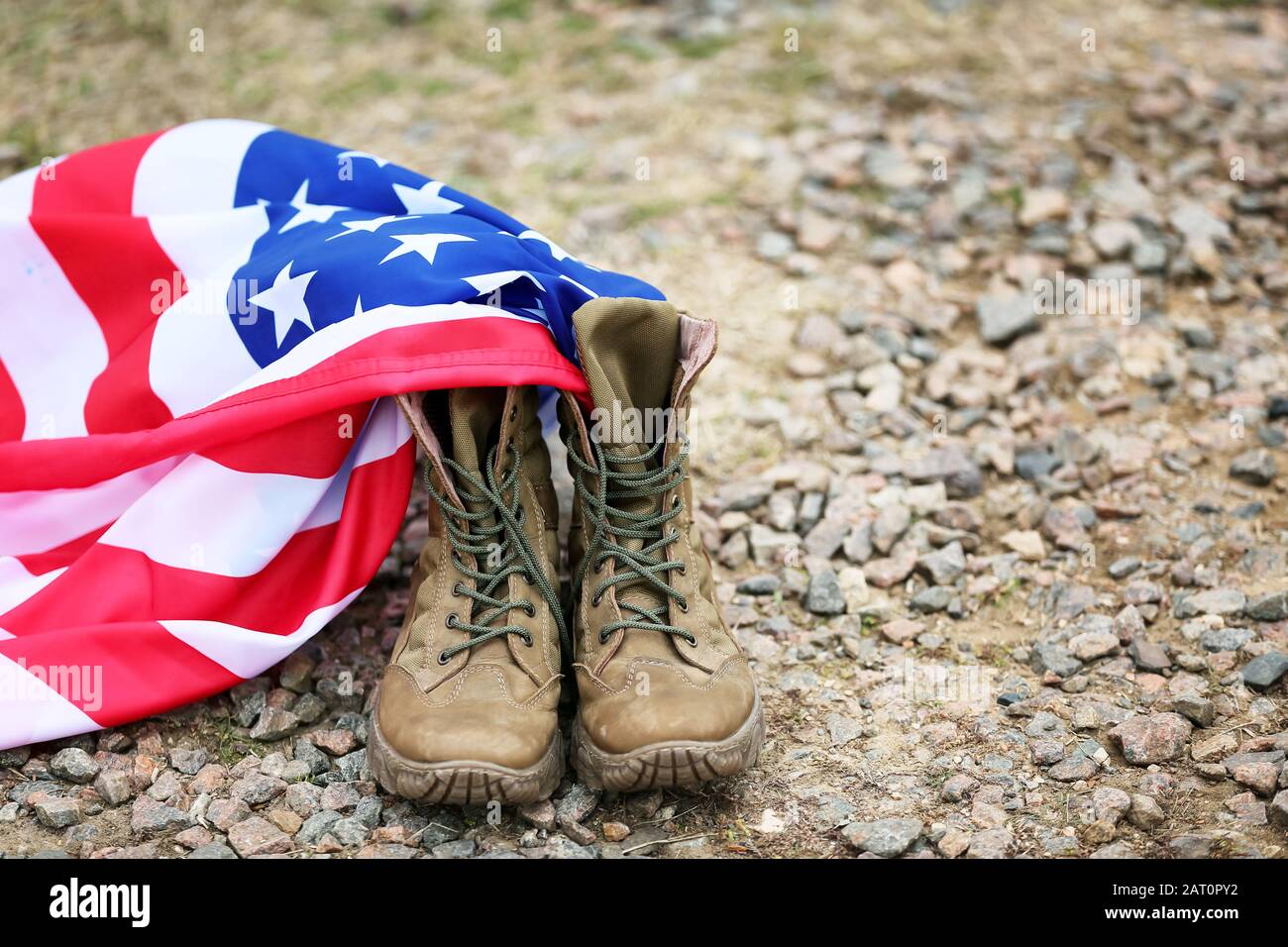 Military boots and USA flag outdoors. Memorial Day celebration Stock ...