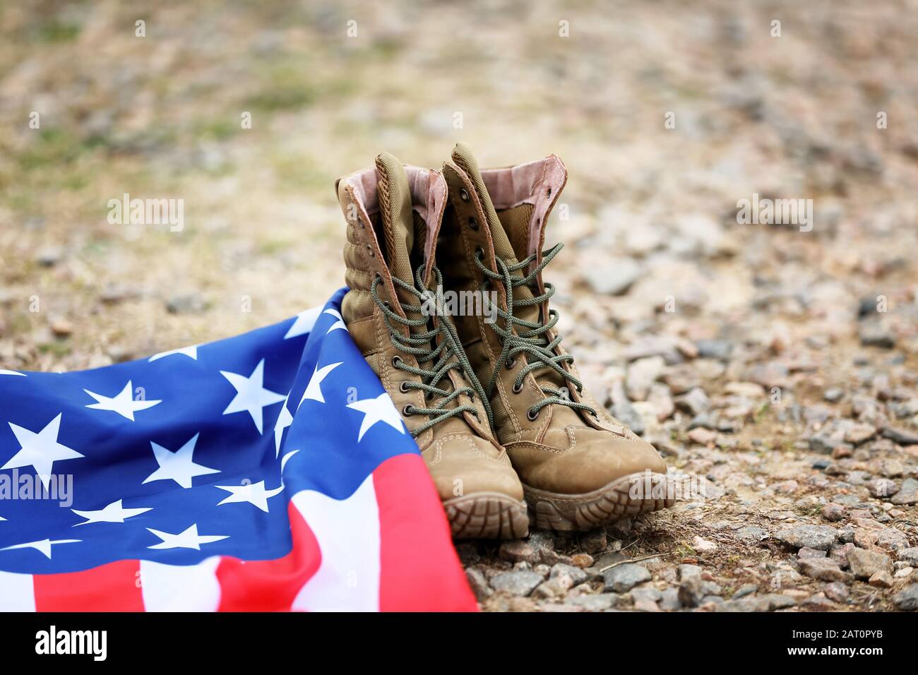 Military boots and USA flag outdoors. Memorial Day celebration Stock ...