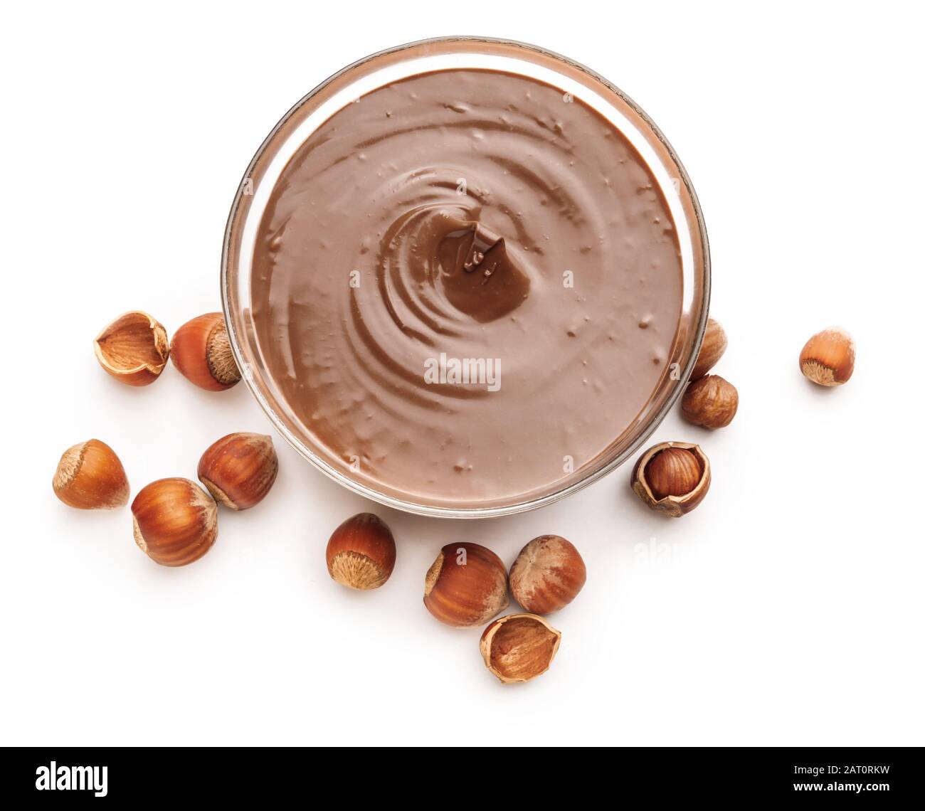 Tasty chocolate paste with hazelnuts on white background Stock Photo