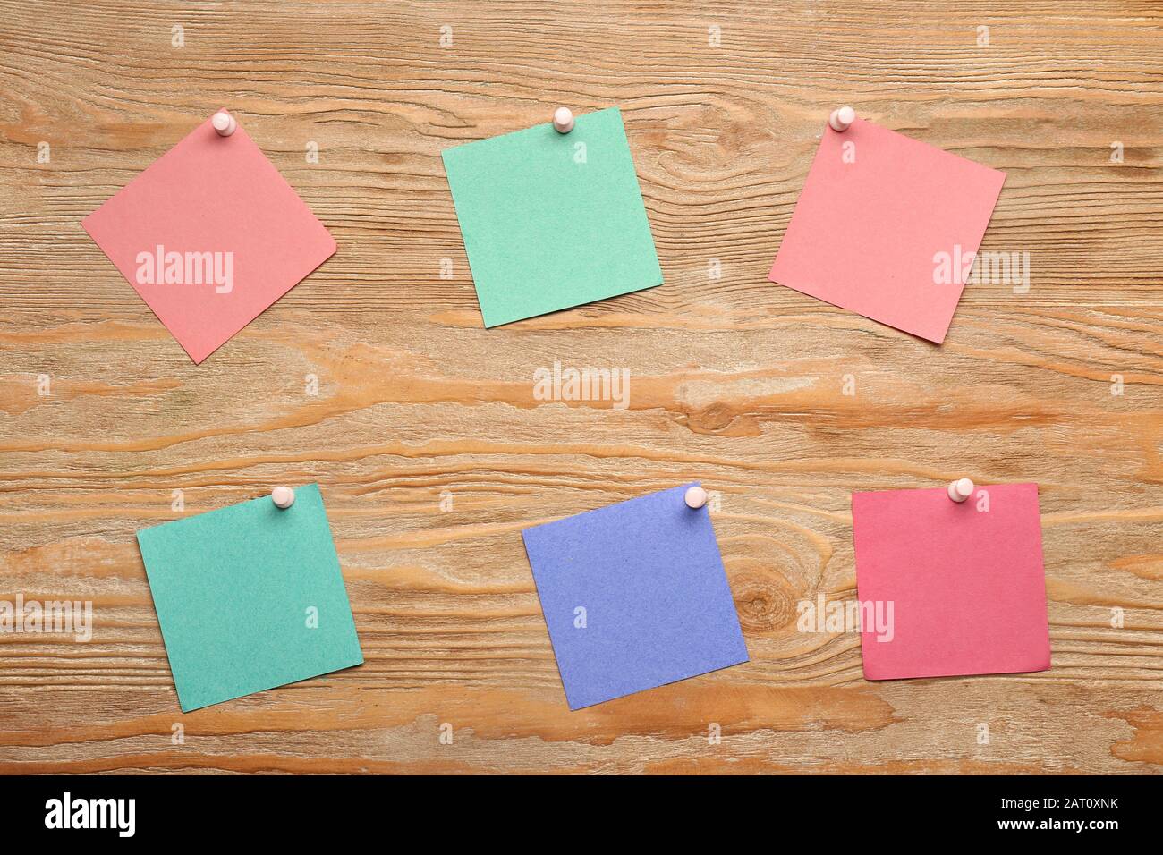 Sticky notes on wooden background Stock Photo