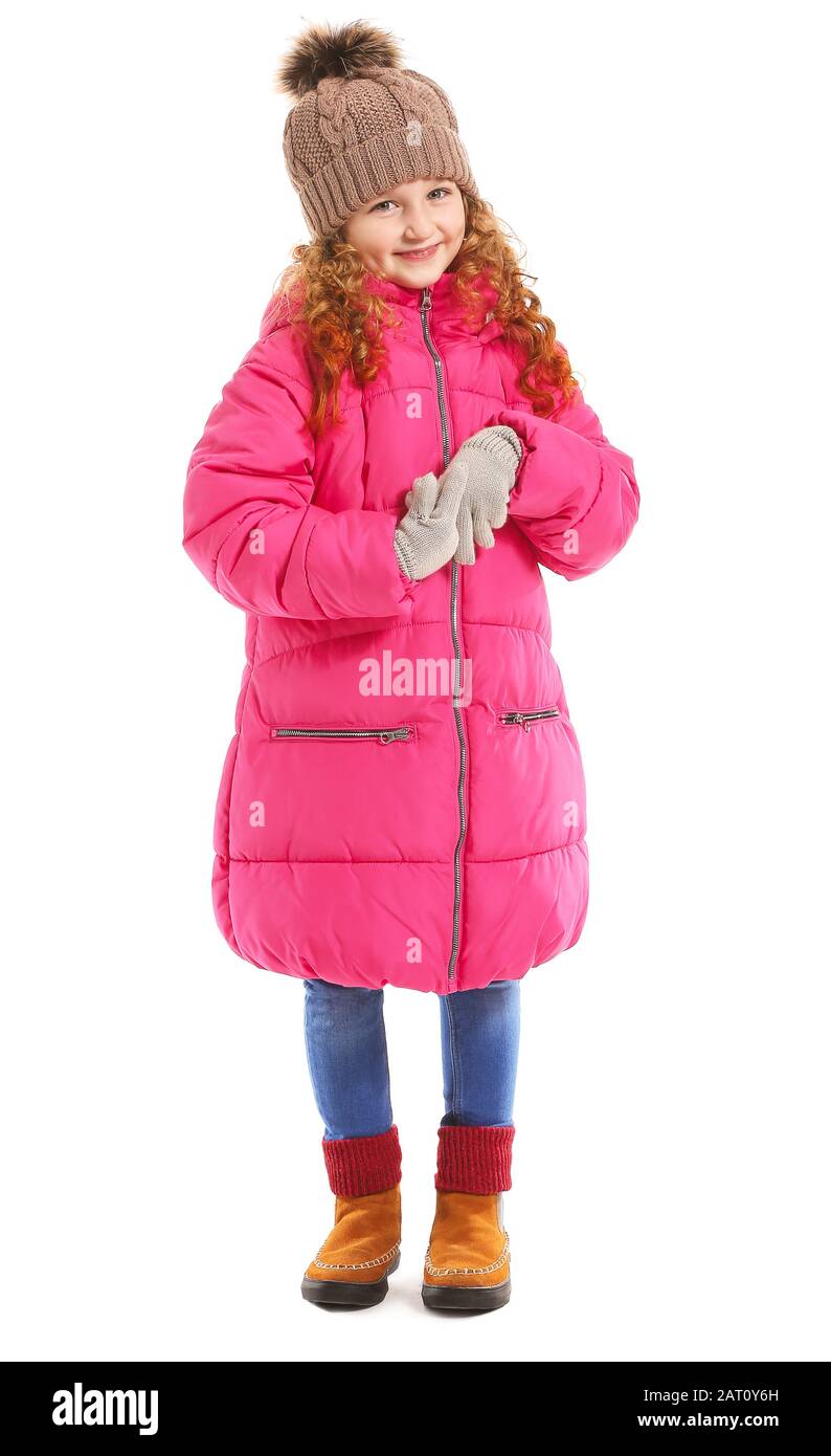 Cute little girl in winter clothes on white background Stock Photo - Alamy
