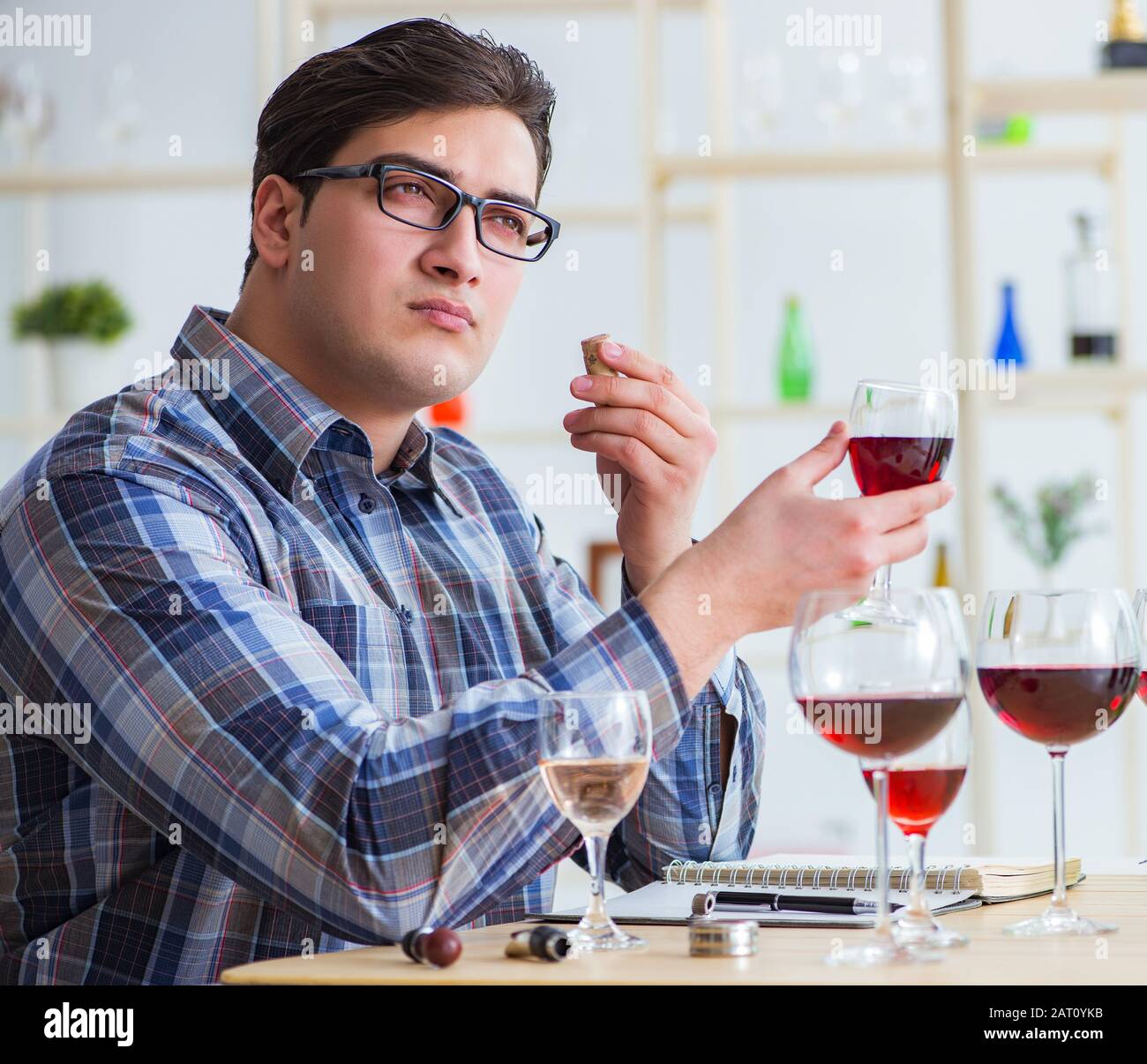 The professional sommelier tasting red wine Stock Photo Alamy