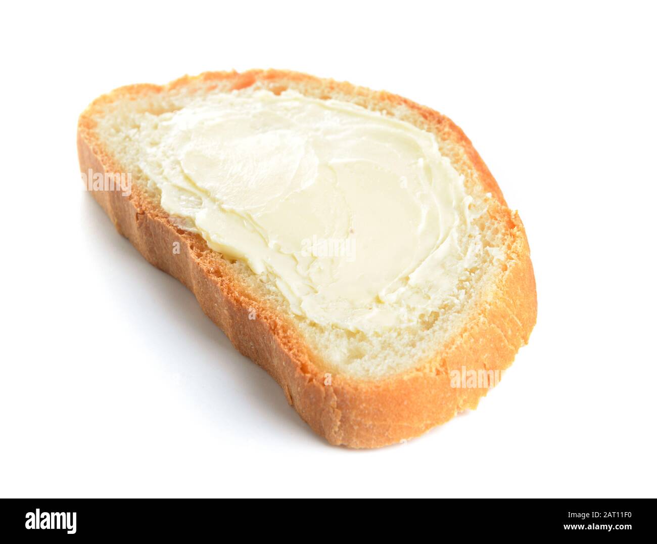 Slice of bread with butter on white background Stock Photo - Alamy