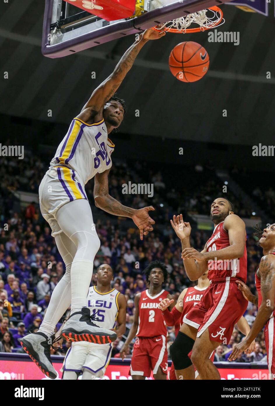 January 29, 2020: LSU's Emmitt Williams (5) goes for a dunk in front of Alabama's John Petty Jr. (23) during NCAA Basketball action between the Alabama Crimson Tide and the LSU Tigers at the Pete Maravich Assembly Center in Baton Rouge, LA. Jonathan Mailhes/CSM Credit: Cal Sport Media/Alamy Live News Stock Photo