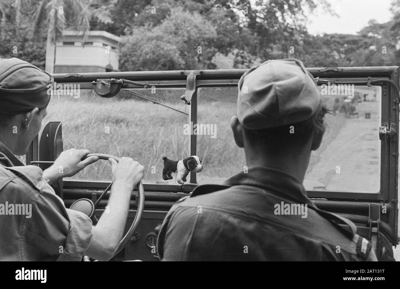Reportage Semarang and surroundings  A fabric dog as a mascot in an army jeep Date: 1947/01/01 Location: Indonesia, Java, Dutch East Indies, Semarang Stock Photo