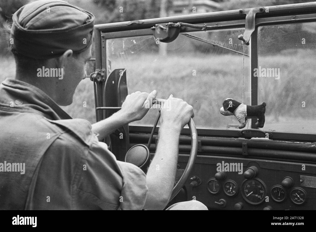 Reportage Semarang and surroundings  A fabric dog as a mascot in an army jeep Date: 1947/01/01 Location: Indonesia, Java, Dutch East Indies, Semarang Stock Photo