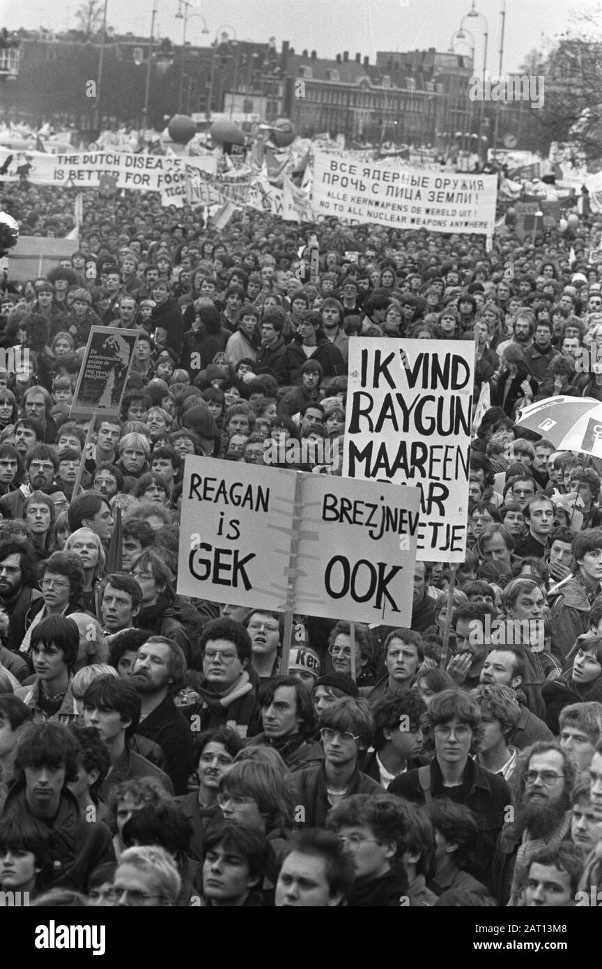 Peace march in Amsterdam by about 350,000 people against nuclear armament  One of the banners during the peace march Reagan is crazy Brezhnev also on the Museum Square Date: November 21, 1981 Location: Amsterdam, Noord-Holland Keywords: banners, peace demonstrations Stock Photo