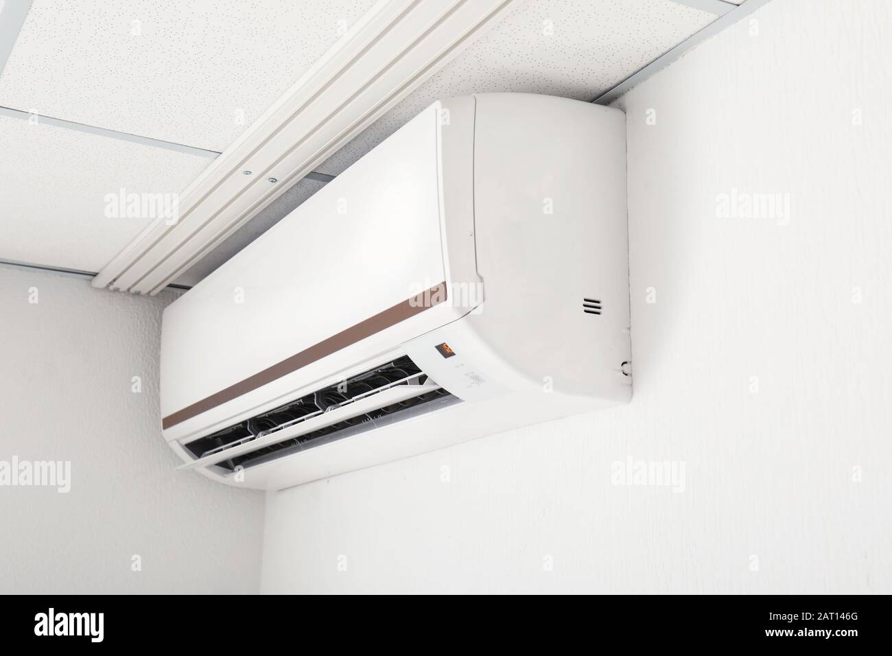 Modern air conditioner on wall Stock Photo - Alamy