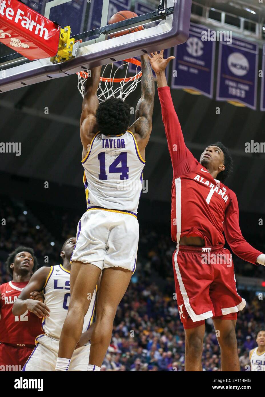 Baton Rouge, LA, USA. 29th Jan, 2020. Alabama's Herbert Jones (1) tries to block the shot of LSU's Marlon Taylor (14) during NCAA Basketball action between the Alabama Crimson Tide and the LSU Tigers at the Pete Maravich Assembly Center in Baton Rouge, LA. Jonathan Mailhes/CSM/Alamy Live News Stock Photo