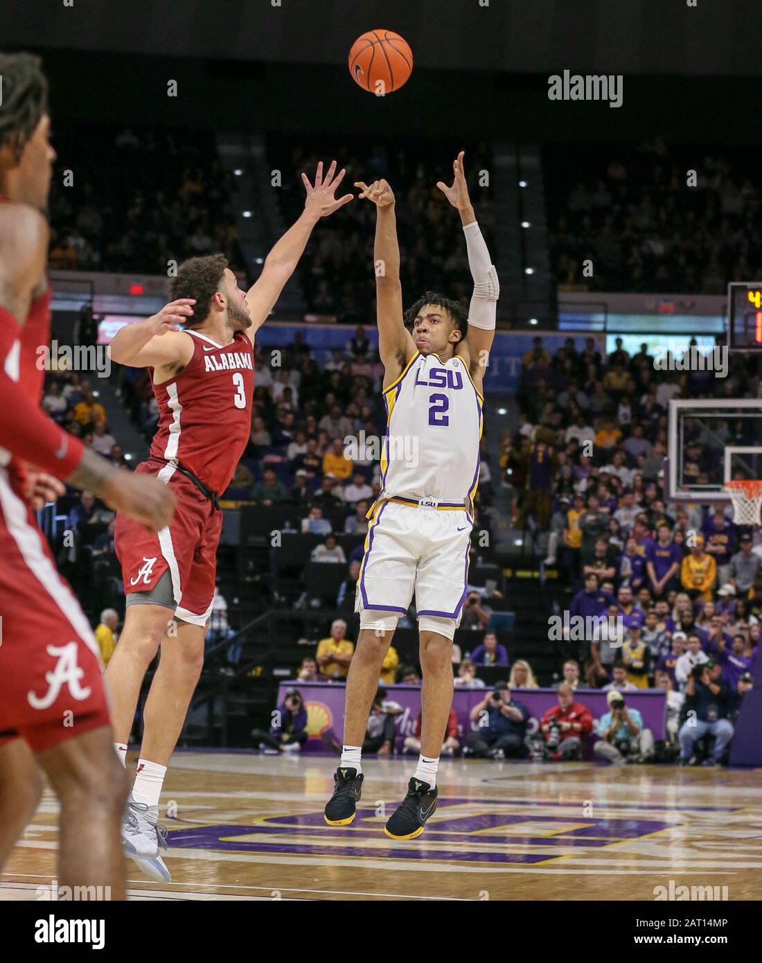 Baton Rouge, LA, USA. 29th Jan, 2020. LSU's Trendon Watford (2) puts up a shot over Alabama's Alex Reese (3) during NCAA Basketball action between the Alabama Crimson Tide and the LSU Tigers at the Pete Maravich Assembly Center in Baton Rouge, LA. Jonathan Mailhes/CSM/Alamy Live News Stock Photo
