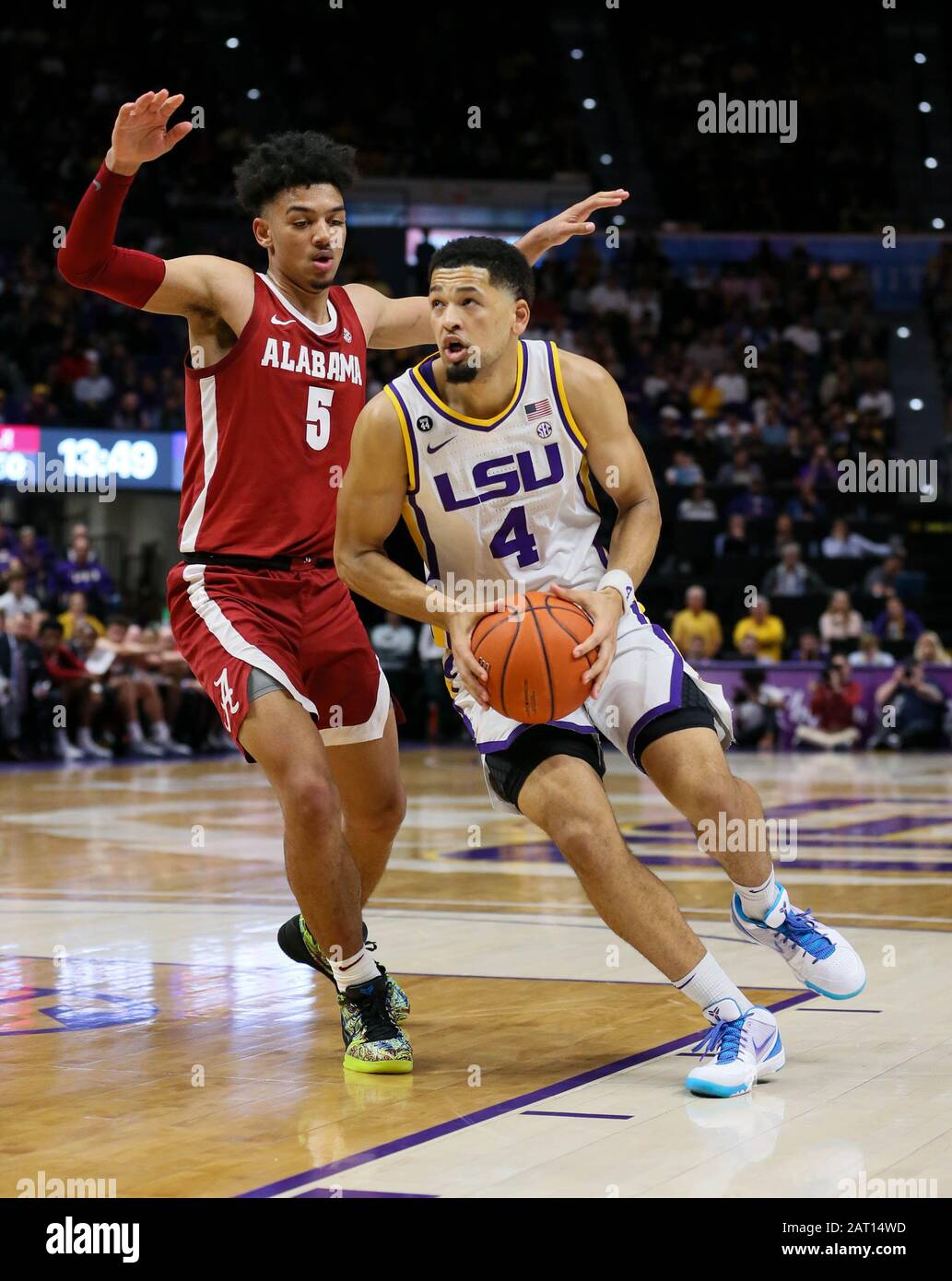 Baton Rouge, LA, USA. 29th Jan, 2020. LSU's Skylar Mays (4) drives around Alabama's Jaden Shackelford (5) during NCAA Basketball action between the Alabama Crimson Tide and the LSU Tigers at the Pete Maravich Assembly Center in Baton Rouge, LA. Jonathan Mailhes/CSM/Alamy Live News Stock Photo