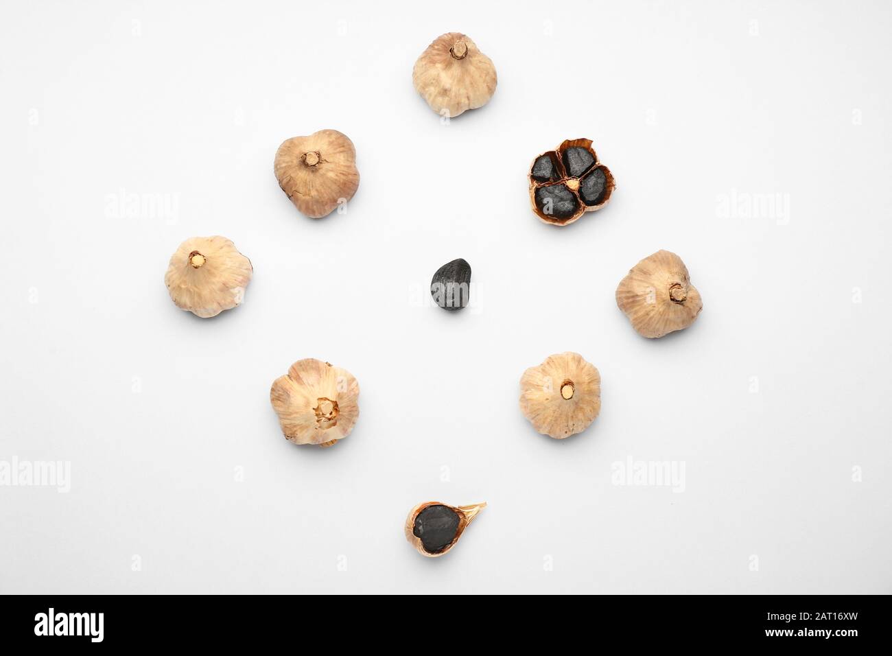 Black garlic on white background Stock Photo