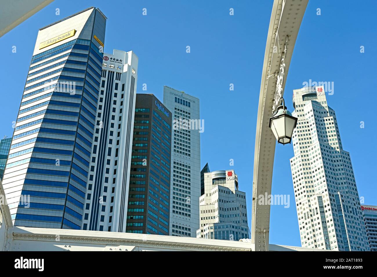 singapore, singapore - 2020.01.25: view through structures of anderson bridge onto high rise office buildings of central business district (cbd) Stock Photo