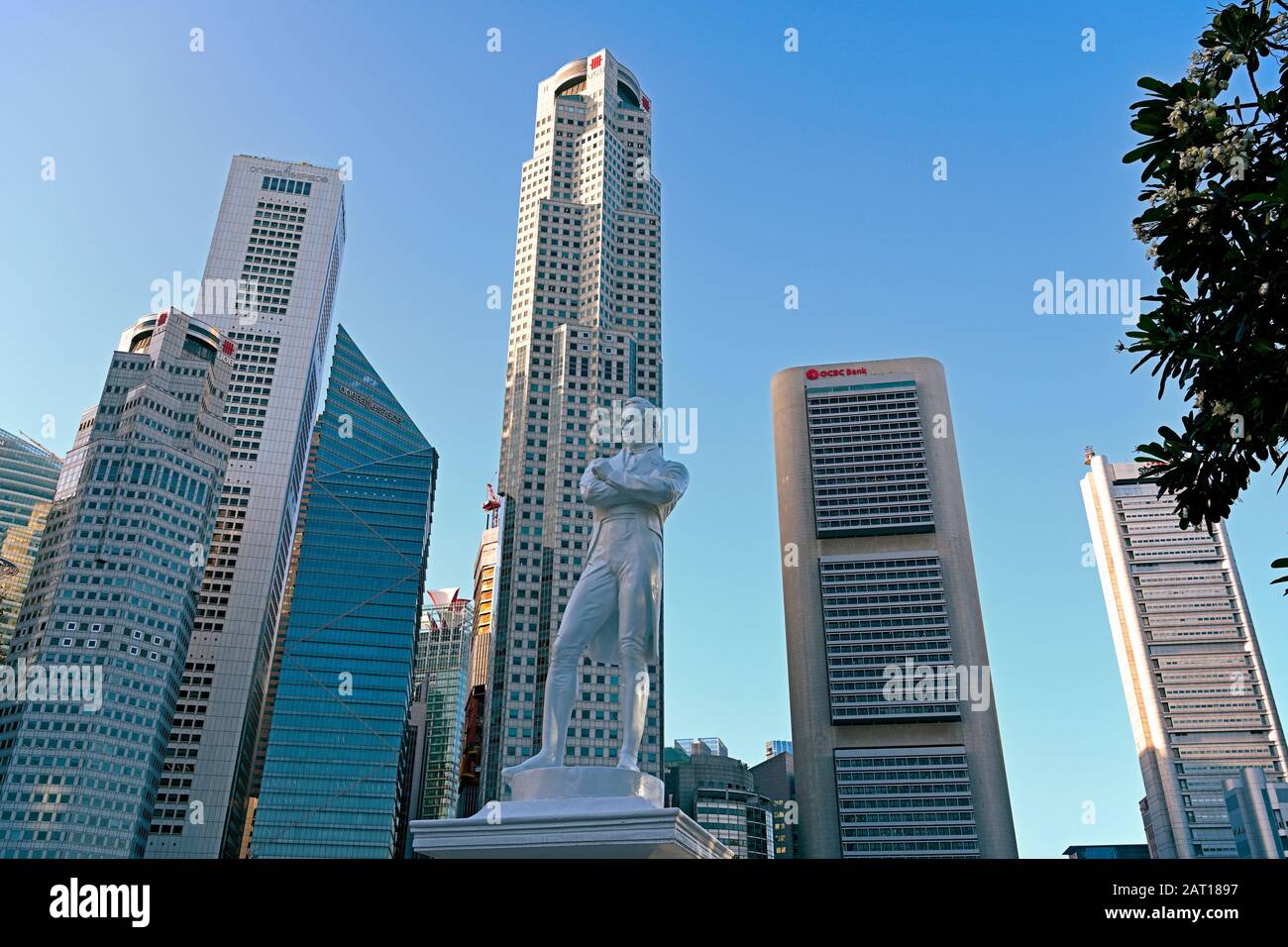 singapore, singapore - 2020.01.24: view from empress place with thomas stamford raffles statue at raffles landing place onto high rise office building Stock Photo