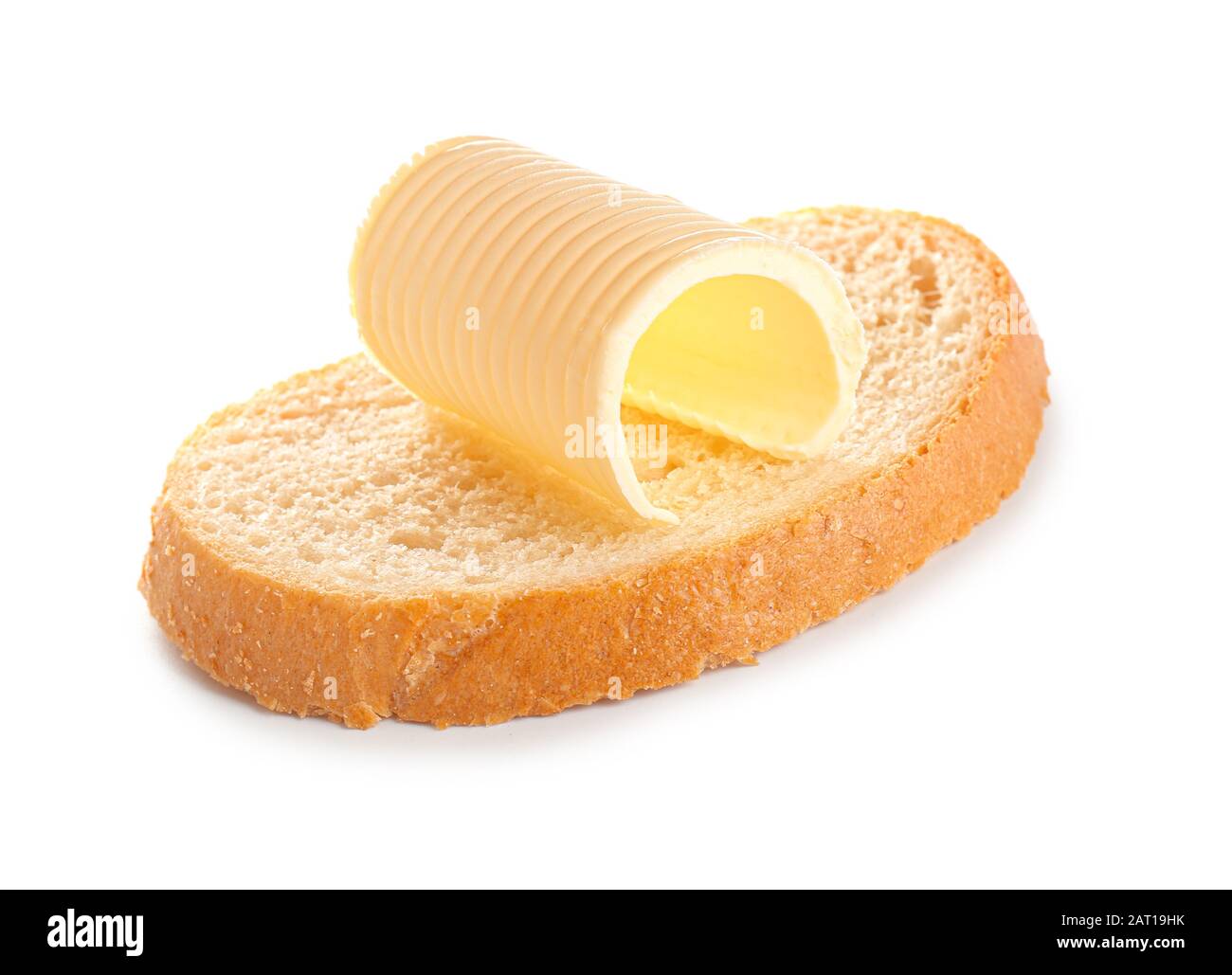 Slice of bread with butter on white background Stock Photo - Alamy