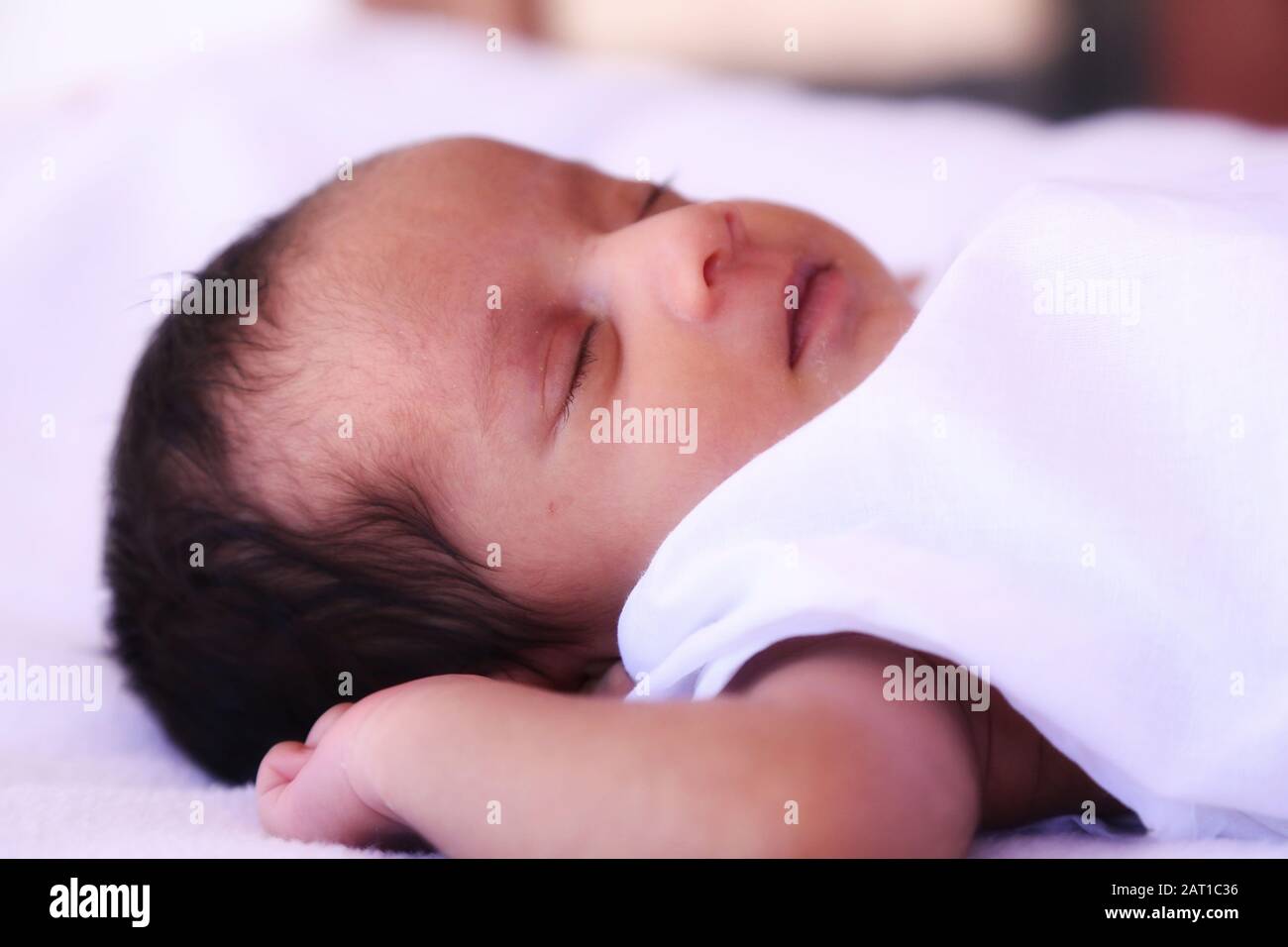 New born Indian baby girl sleeping Stock Photo - Alamy, image size:1300x956