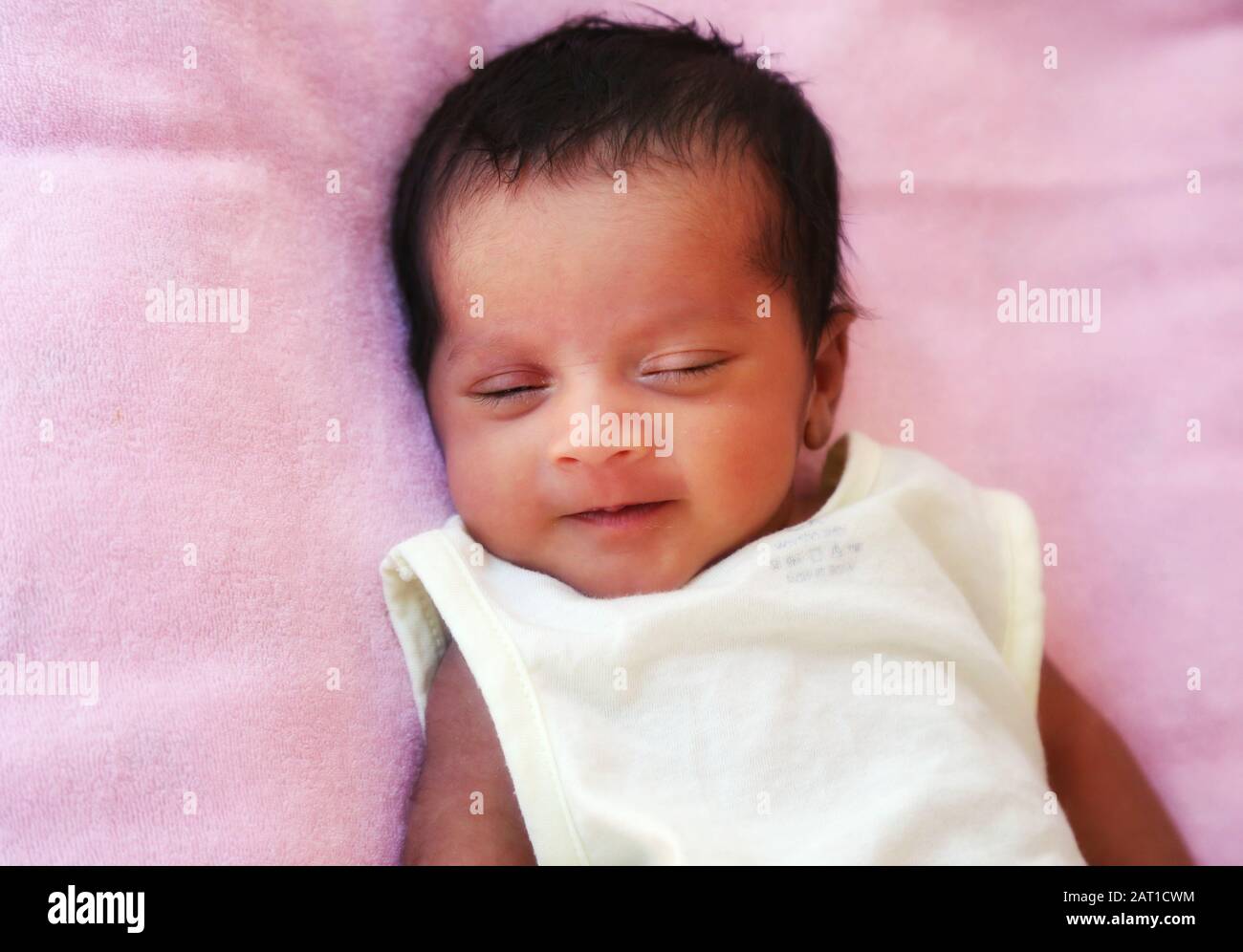 Indian girl sleeping hi-res stock photography and images - Alamy