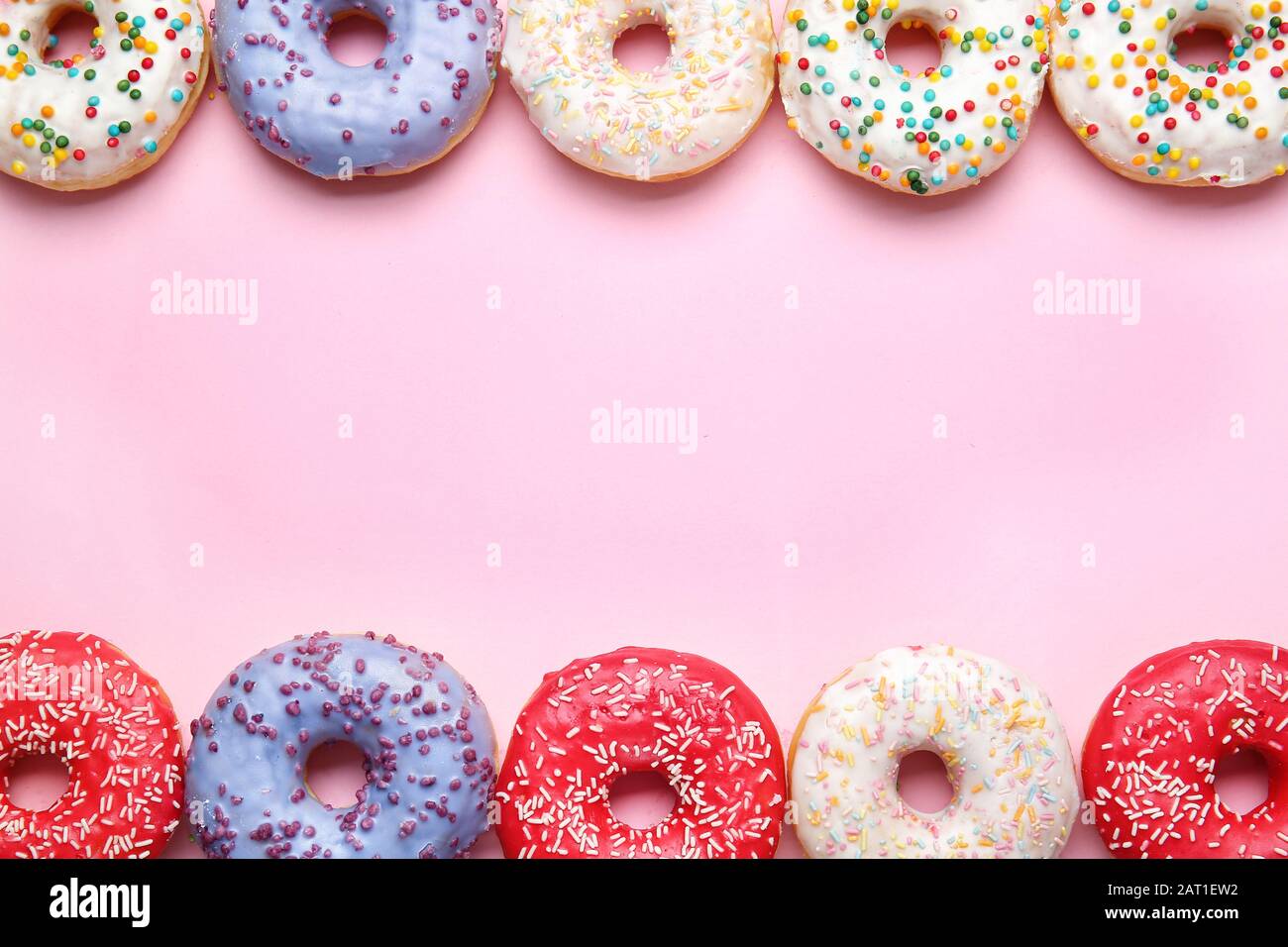 Sweet tasty donuts on color background Stock Photo - Alamy