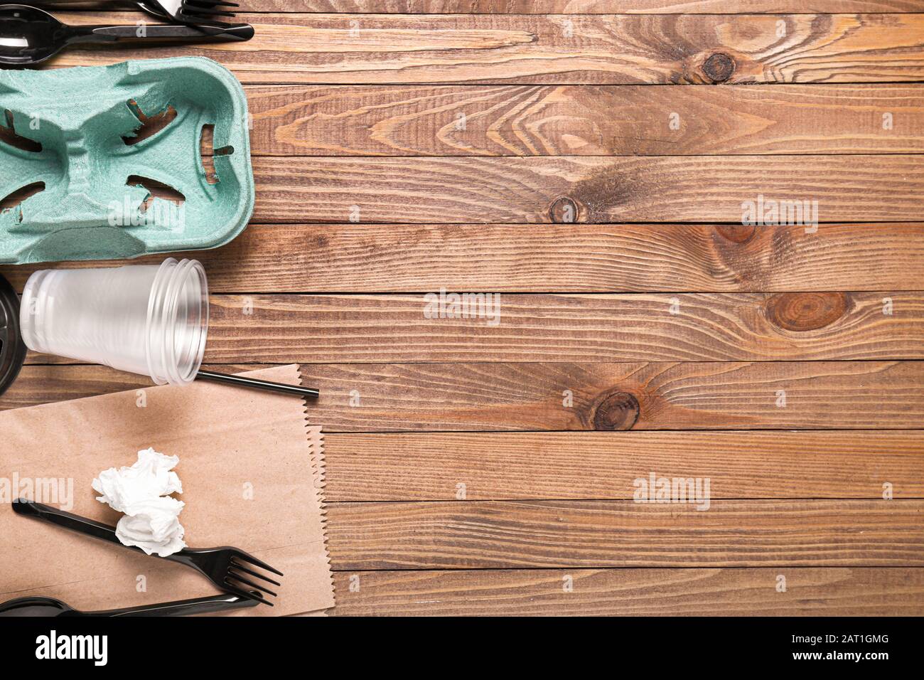 Different Garbage On Wooden Background Recycling Concept Stock