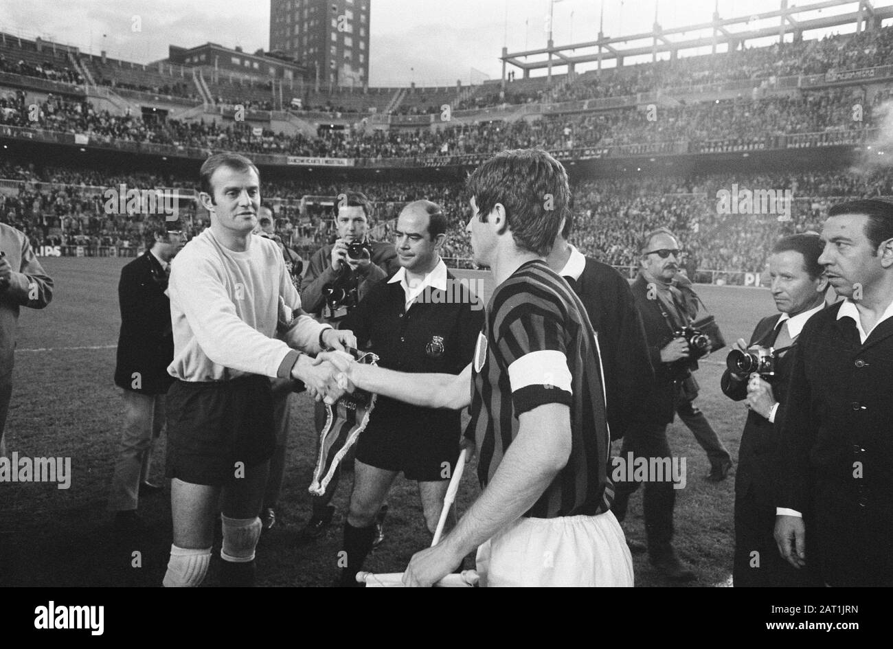 Europe Cup Final in Madrid. Ajax versus AC Milan 1-4. Toss at the start of  the game. Gert Bals (left) handed over to the Italian captain Gianni  Rivera. Between them in referee