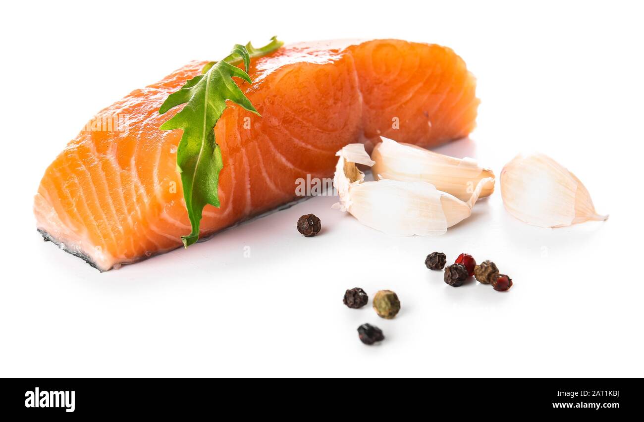 Raw salmon fillet on white background Stock Photo - Alamy