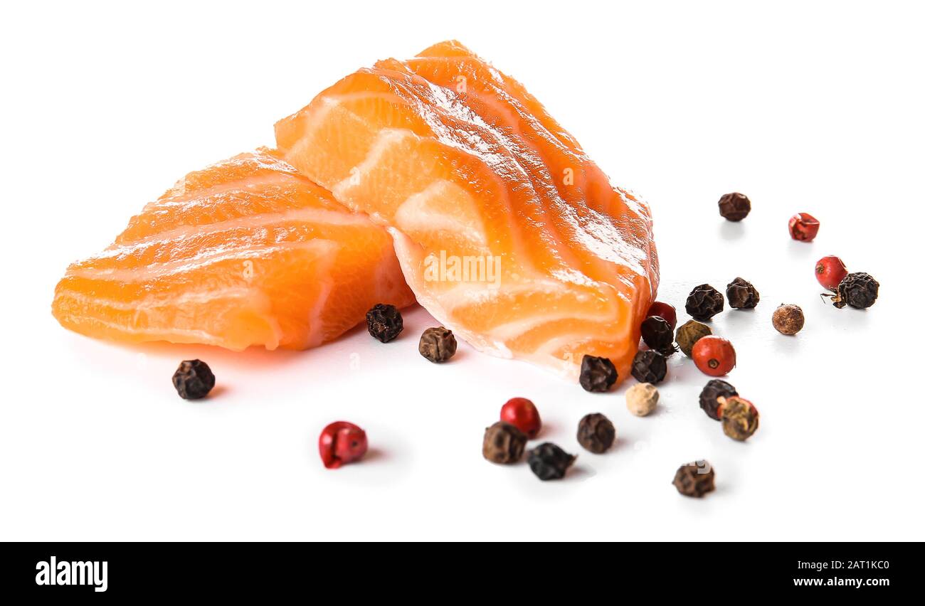 Raw salmon fillet on white background Stock Photo - Alamy