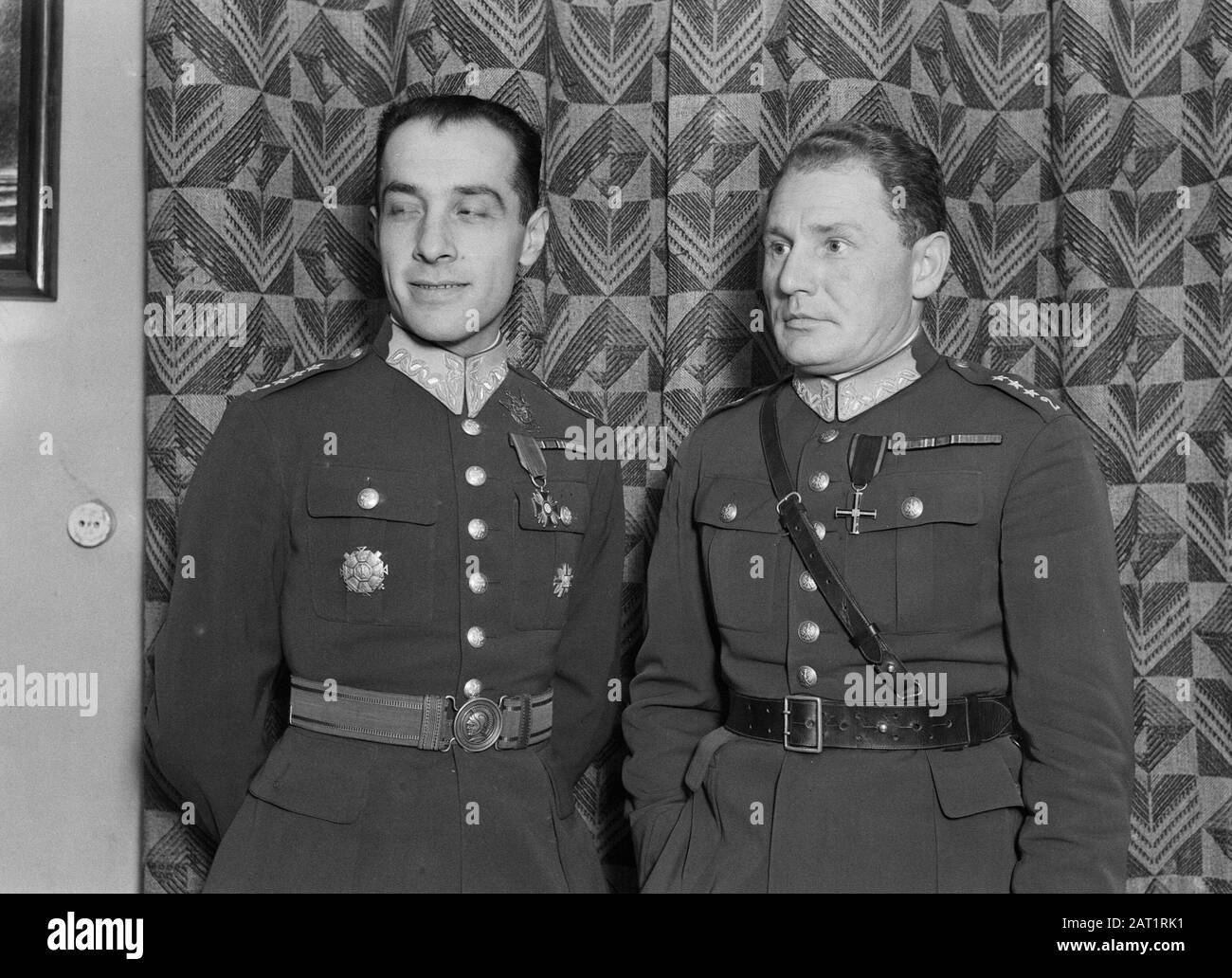 Travel to Poland  Warsaw. Portrait of the Air Force Captains and Ballooners Zbigniew Burzynski (1902-1971) and Franciszek Hynek (1897-1958) Annotation: These two Air Force Officers have made themselves meritorious for Polish aviation. Their interest was the balloon flight and the airship (zeppelin). As balloons, they won the Gordon Bennett Cup several times. In 1934 they brought the Polish flight record for air balloons at 44 hours Date: 1934 Location: Poland, Warsaw Keywords: ballooning, Air Force, military Personnel: Hynek, Franciszek, Burzynsk, Zibigniew Stock Photo