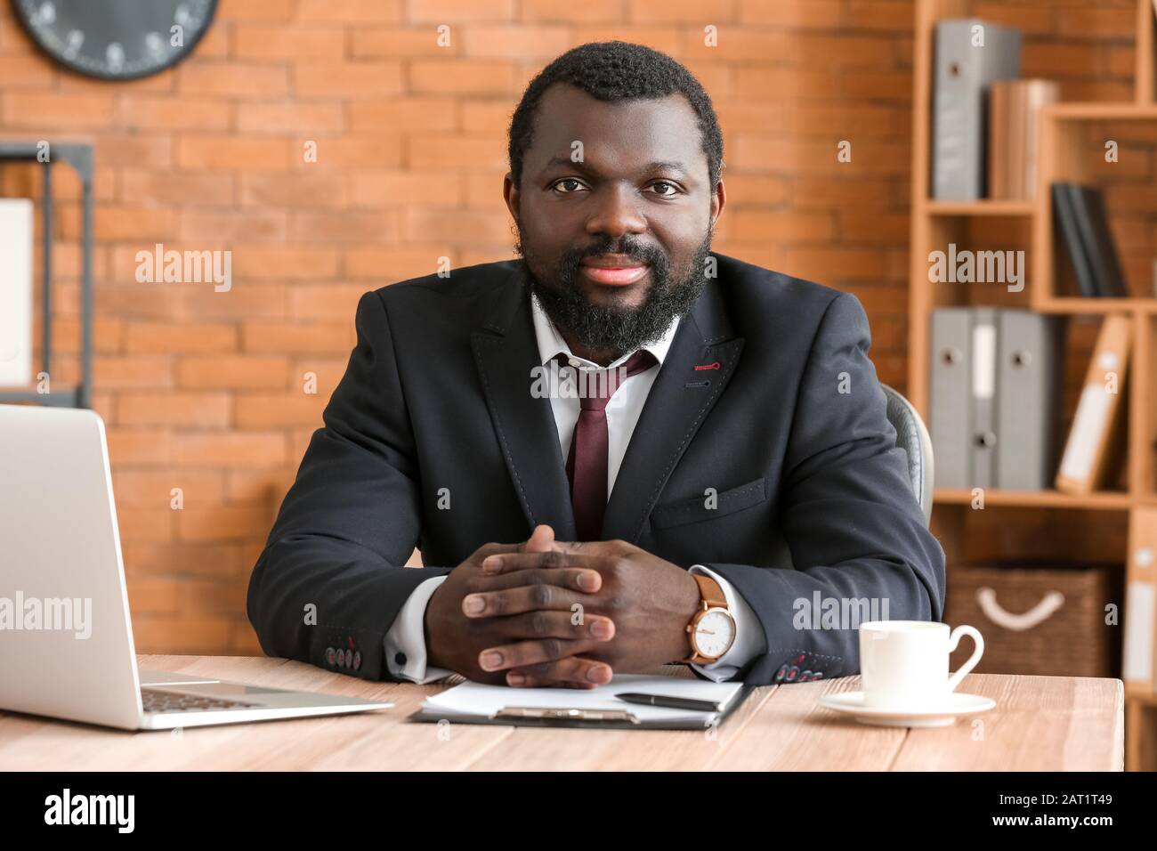 African American lawyer at table in office Stock Photo Alamy