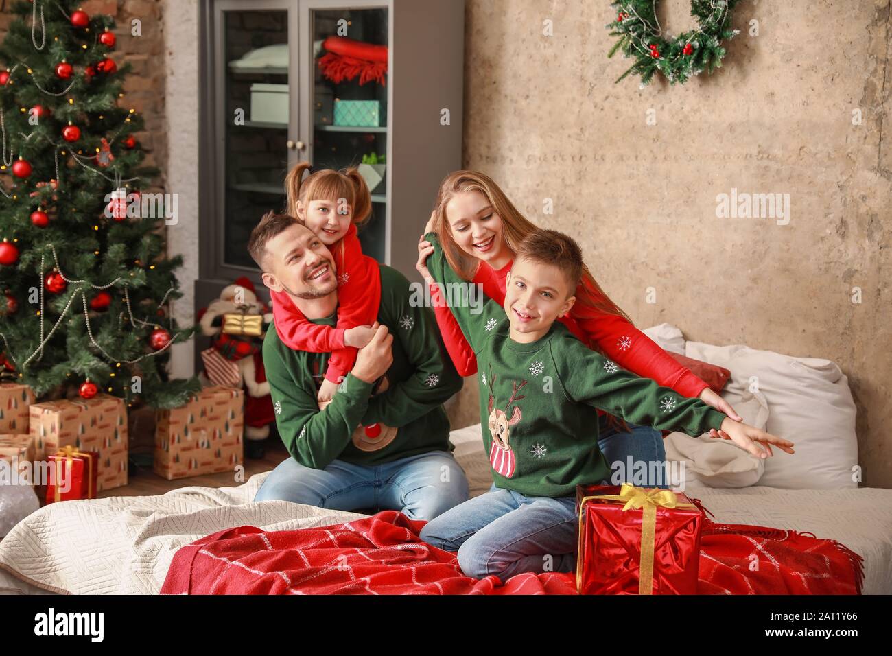 happy-family-on-christmas-eve-at-home-stock-photo-alamy