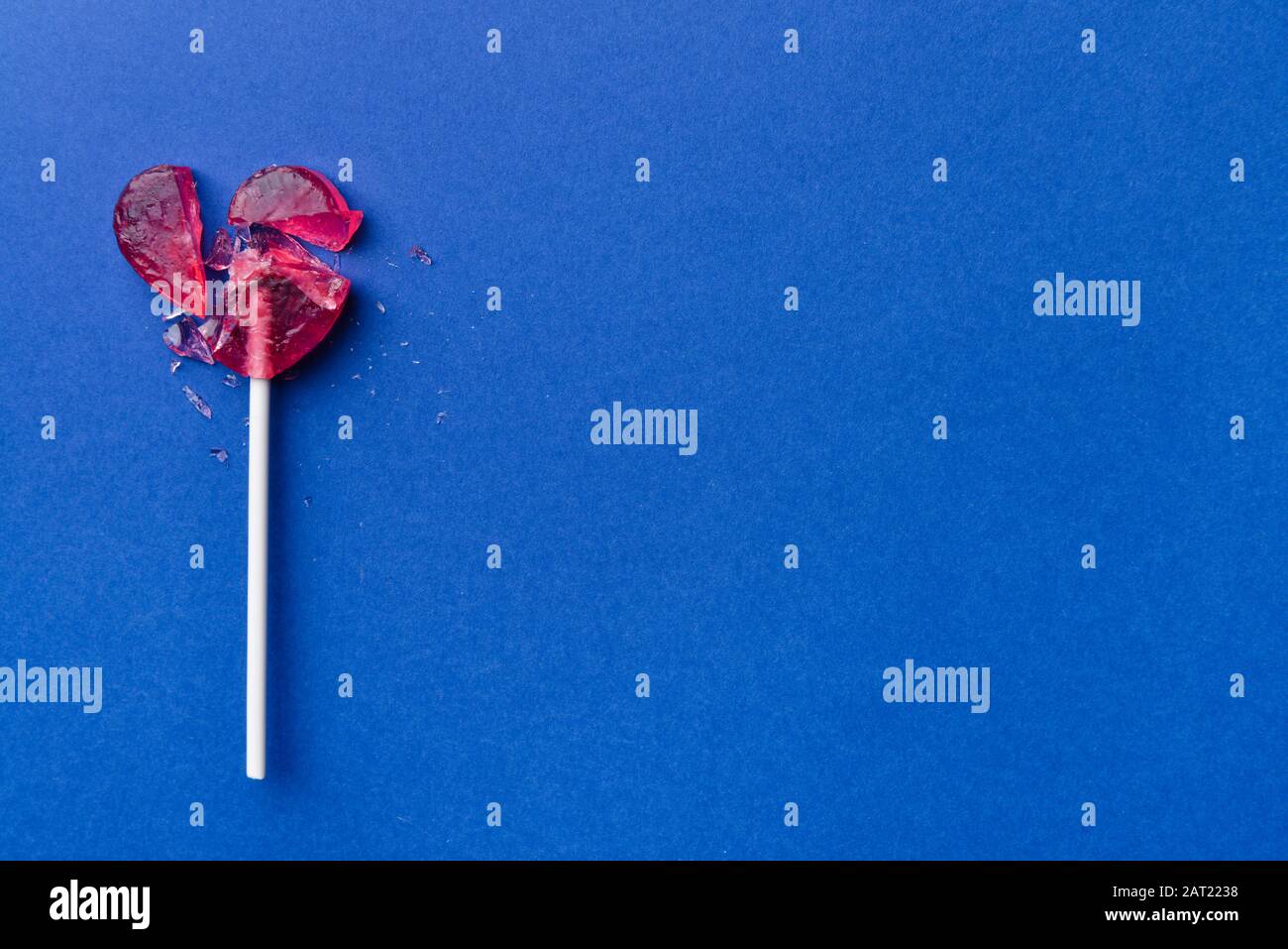 Crushed lollipop on color background Stock Photo Alamy
