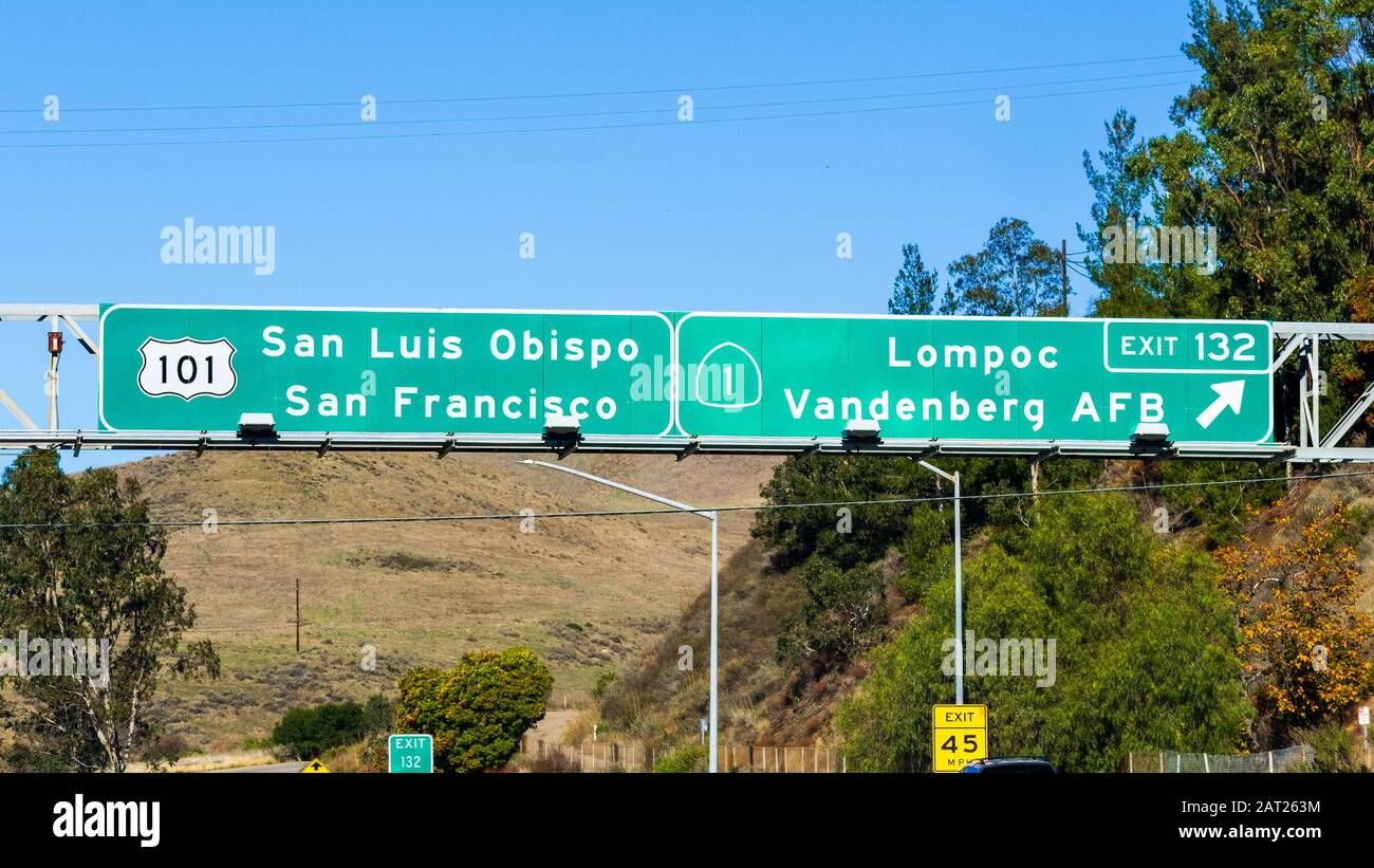 Highway 101 navigational road signage providing guidance towards San Luis Obispo / San Francisco and Lompoc / Vandenberg AFB (exit 132) ; California Stock Photo