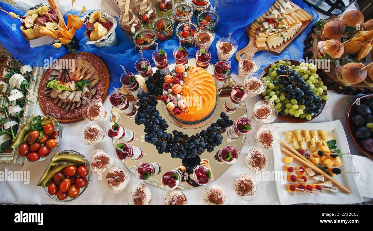 A wide selection of varied colorful snacks on the buffet. Stock Photo
