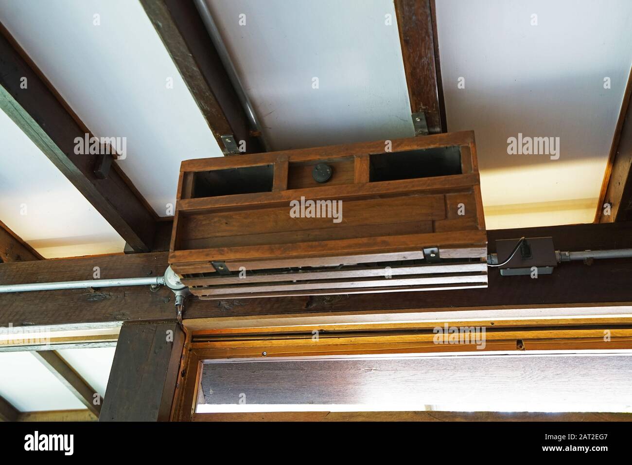 Wooden air conditioning box on ceiling Stock Photo Alamy