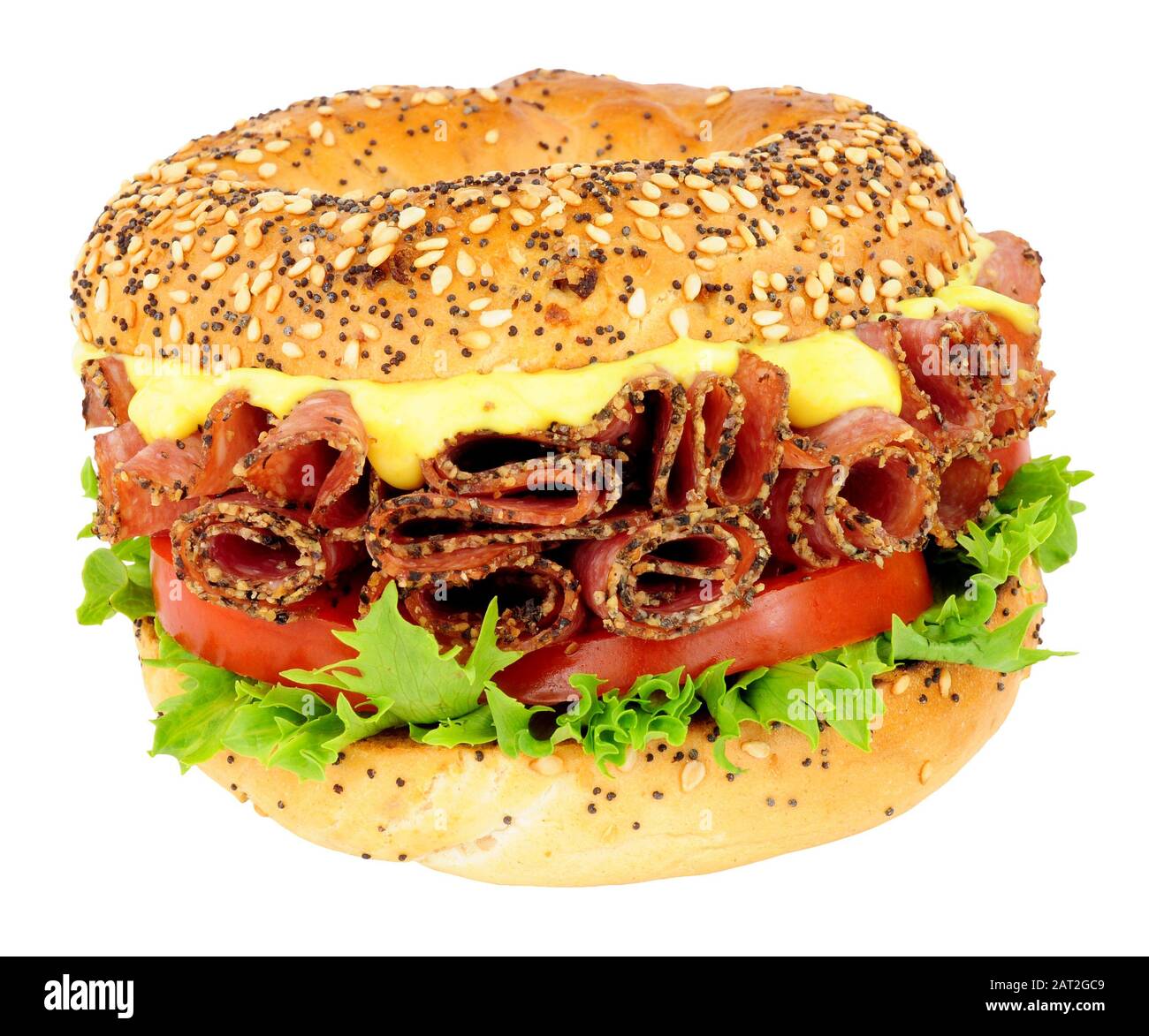 Peppered salami and salad bagel sandwich isolated on a white background Stock Photo