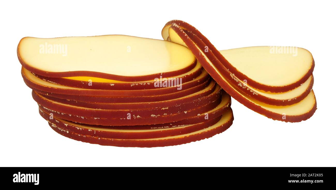 German smoked cheese slices isolated on a white background Stock Photo
