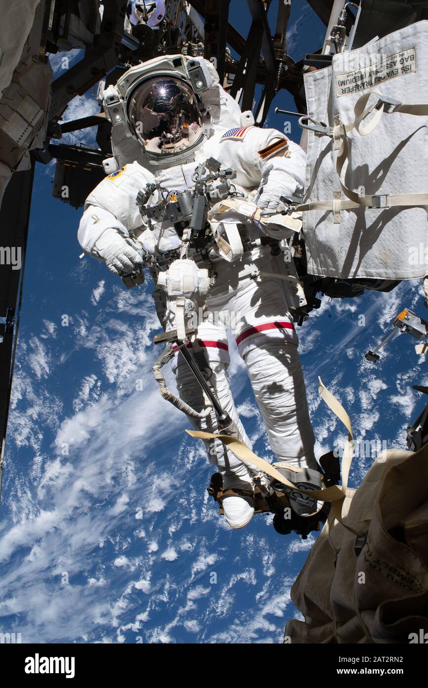 ISS - 25 Jan 2020 - NASA astronaut Andrew Morgan is pictured tethered to the International Space Station while finalizing thermal repairs on the Alpha Stock Photo