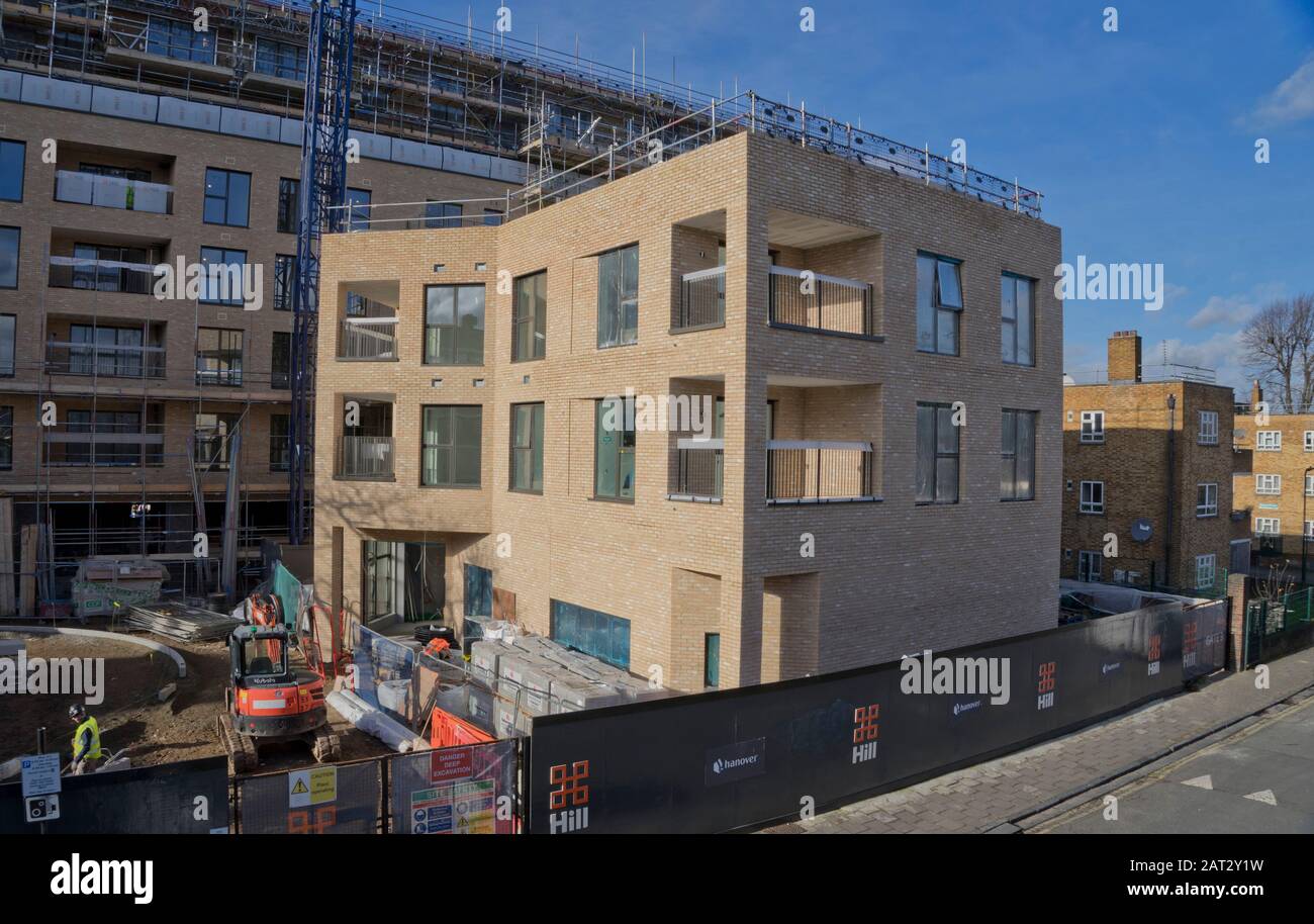 Construction of new luxury housing next to an old social council