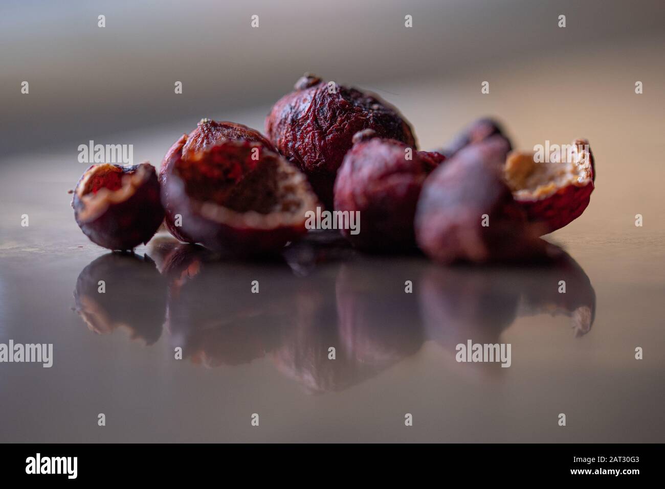 Dried quandong on bartop Stock Photo