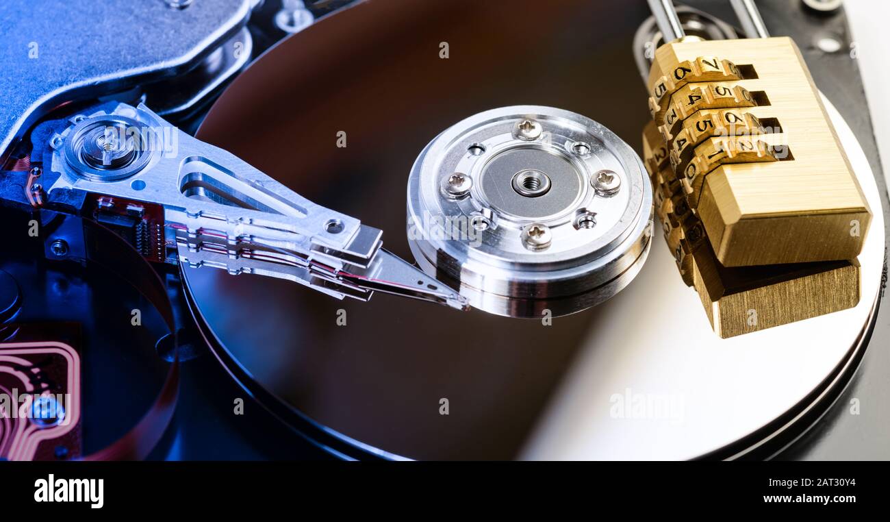 Code numbers pad lock on hard disk, security encryption concept Stock