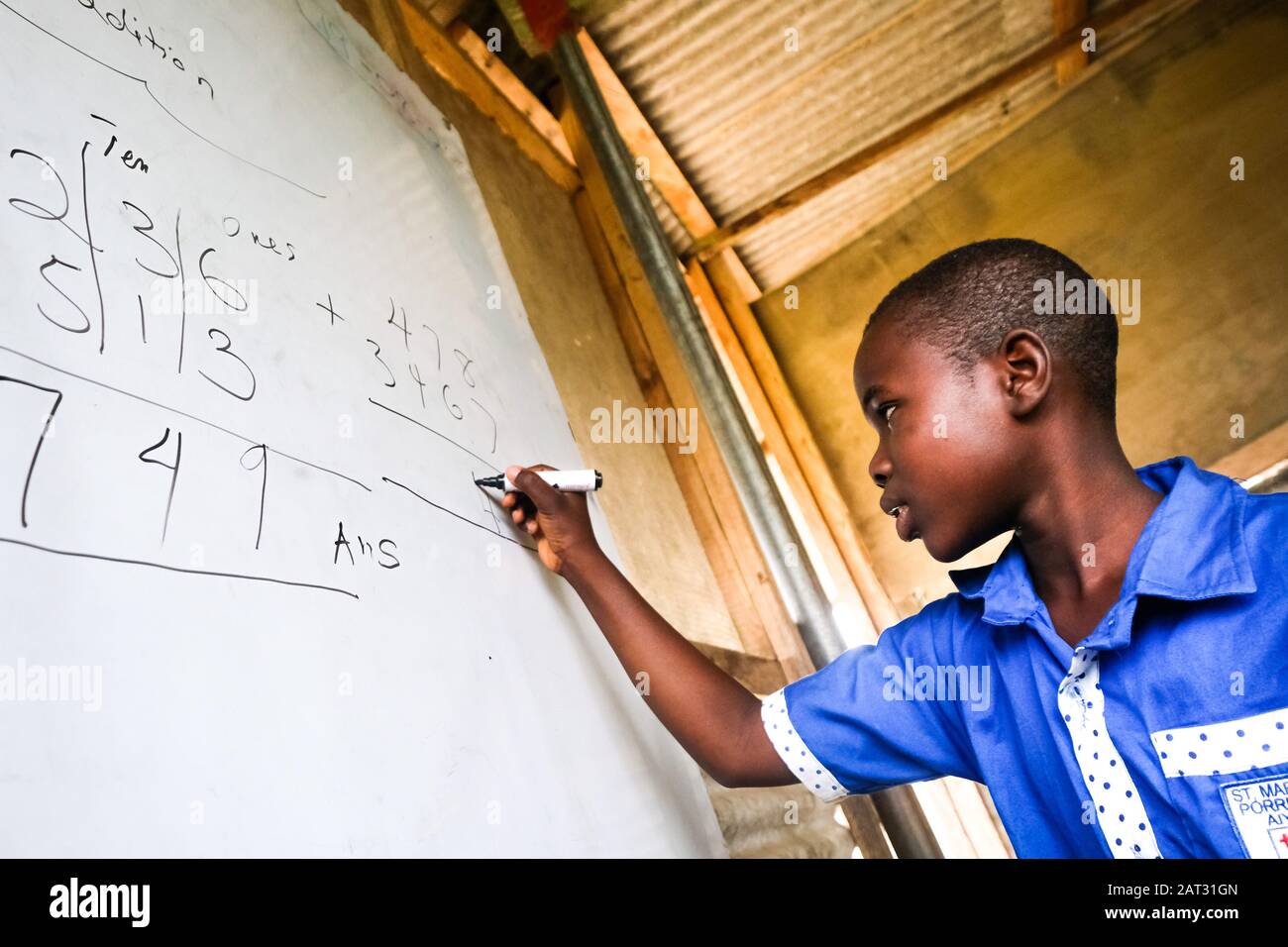 Young Students In The St Martin Des Porres School With Editor Franz Jussen In Awiaso Ghana Africa Stock Photo Alamy