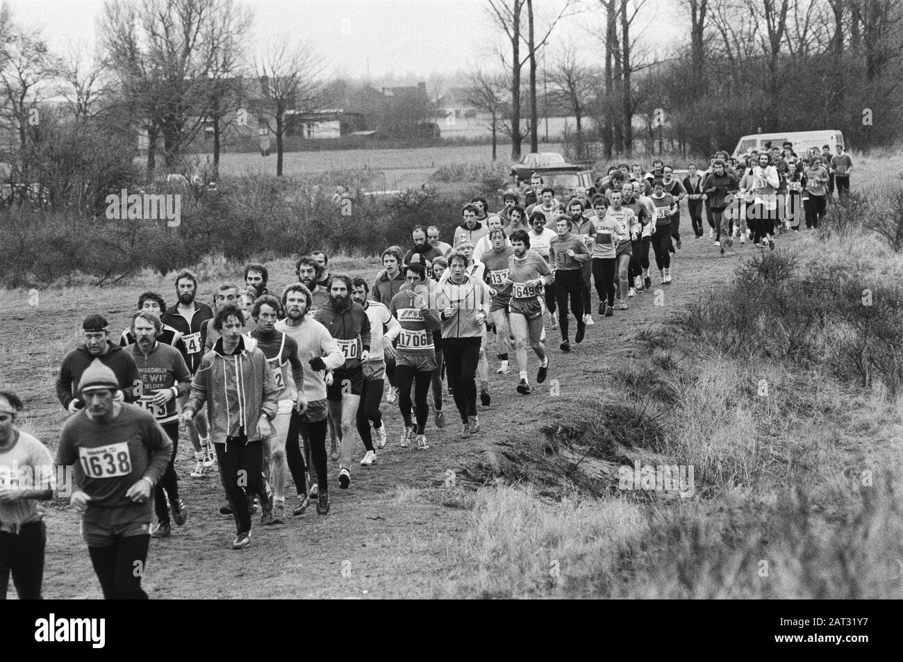 Half marathon run on beach and dunes near Egmond aan Zee participants on the way in the dunes