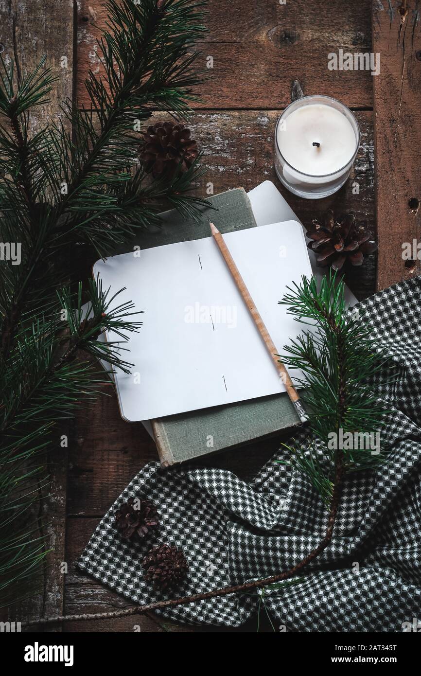 Making notes for the future. Slow winter day routine. Moody atmosphere Stock Photo