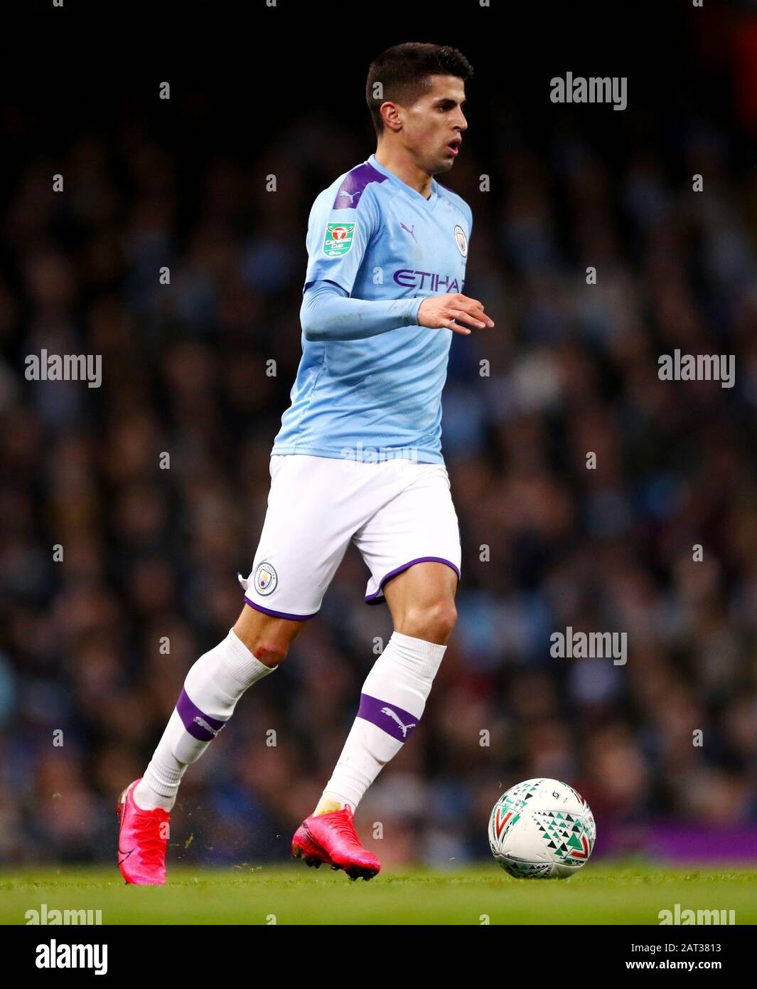 Manchester City's Joao Cancelo during the Carabao Cup Semi Final, second leg match at the Etihad Stadium, Manchester. Stock Photo