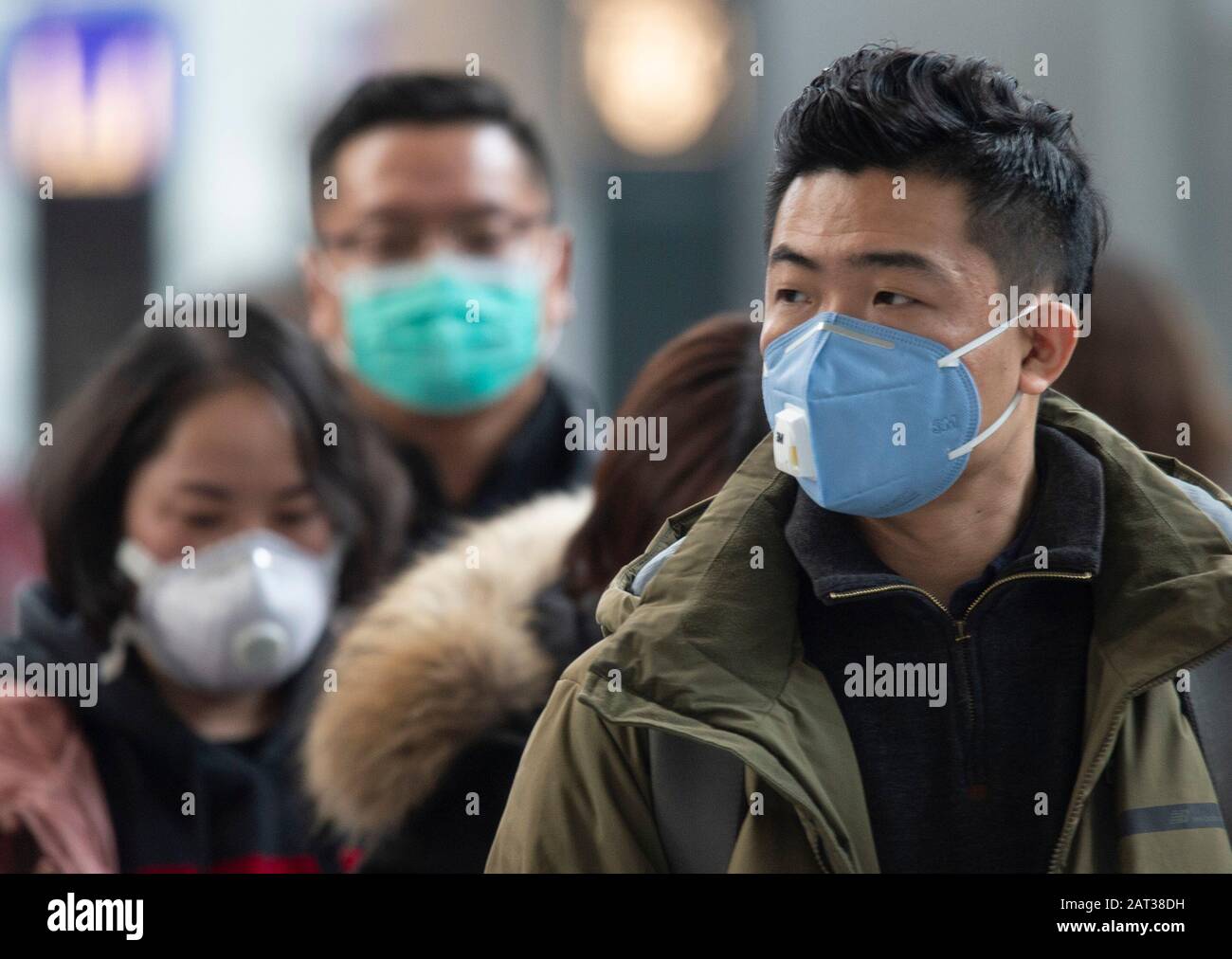 Frankfurt, Hessen, Germany. 30th Jan 2020. Face masks are worn by passengers waiting at